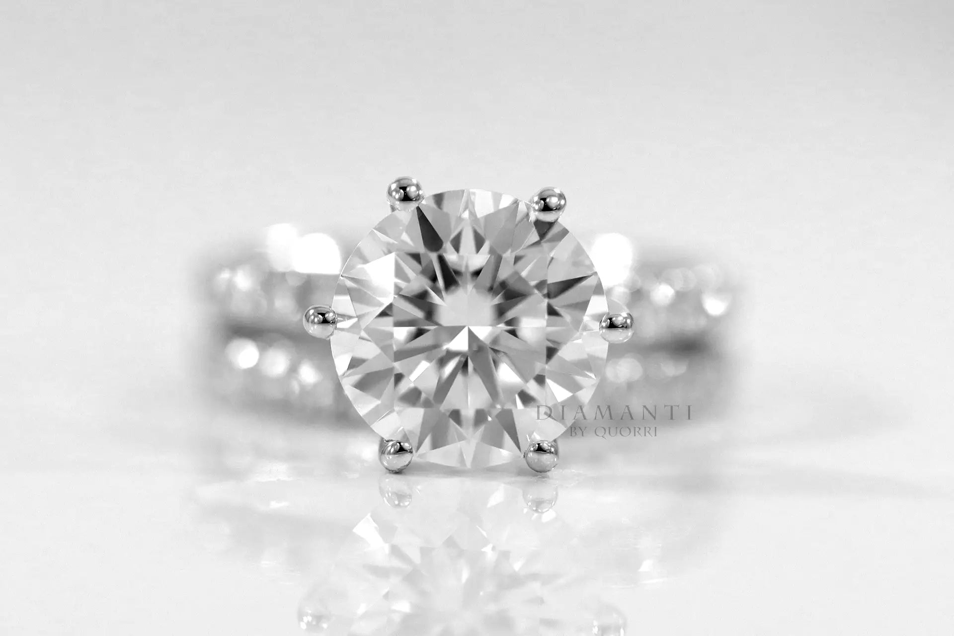 white gold affordable six prong round accented lab diamond engagement ring 