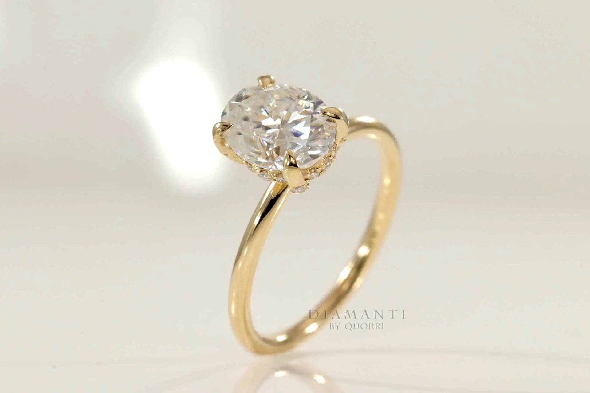 under-halo four claw prong 14k yellow gold 2 carat oval lab diamond engagement ring Quorri