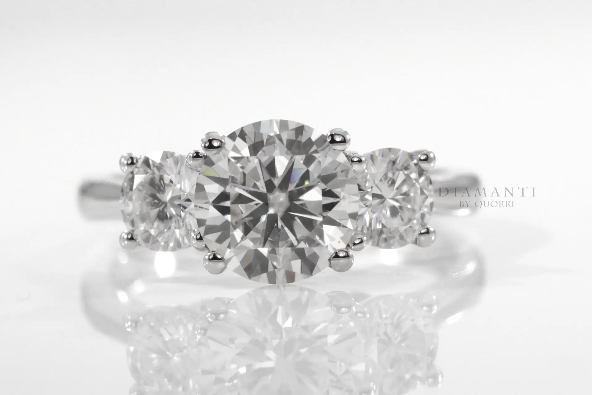 affordable three stone trilogy round lab diamond engagement ring