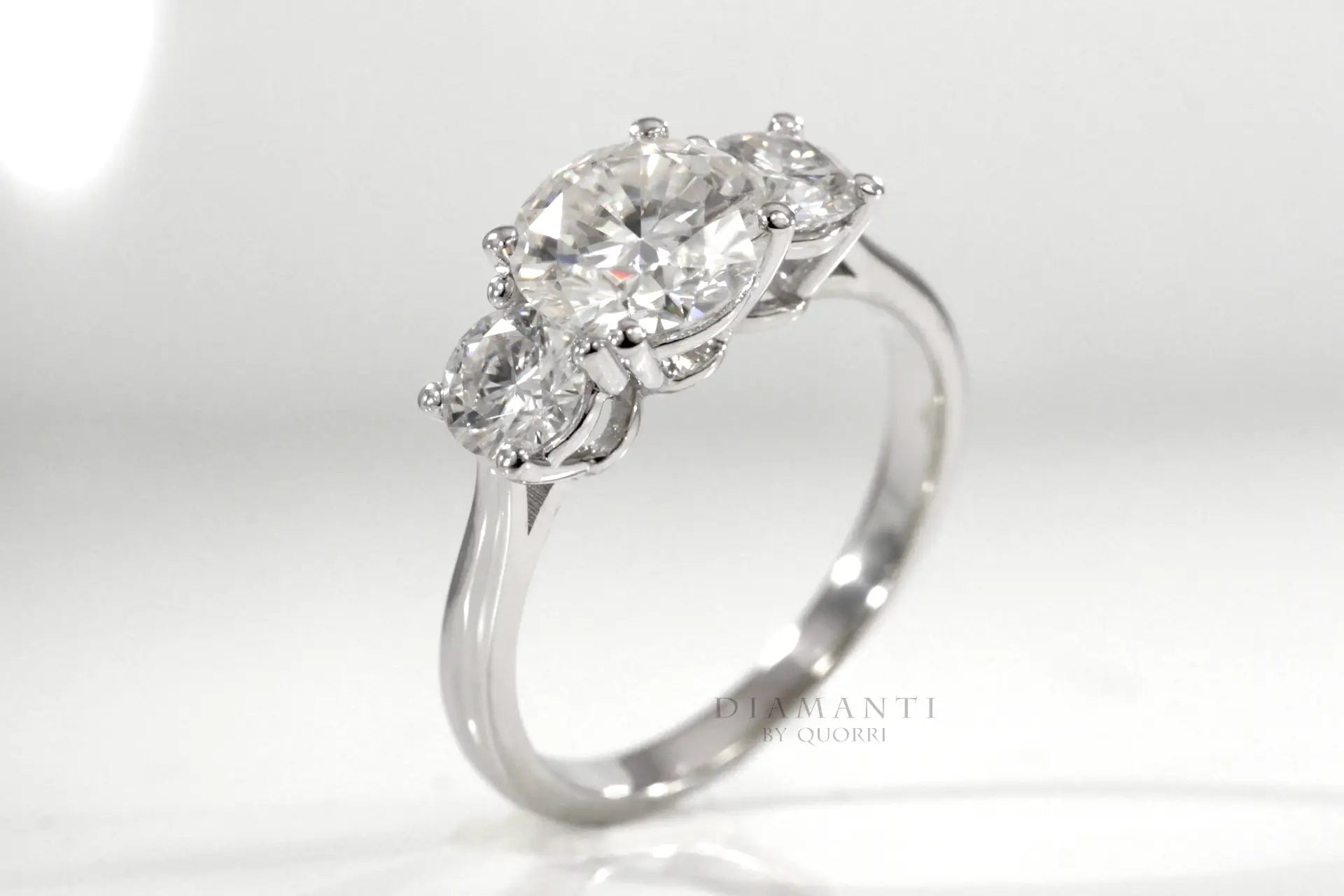 14k white gold affordable three stone trilogy round lab grown diamond engagement ring Quorri