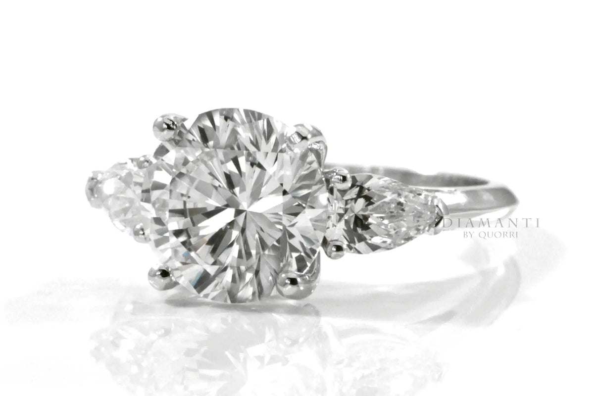 14k white three stone 4ct round and pear accented lab diamond engagement ring