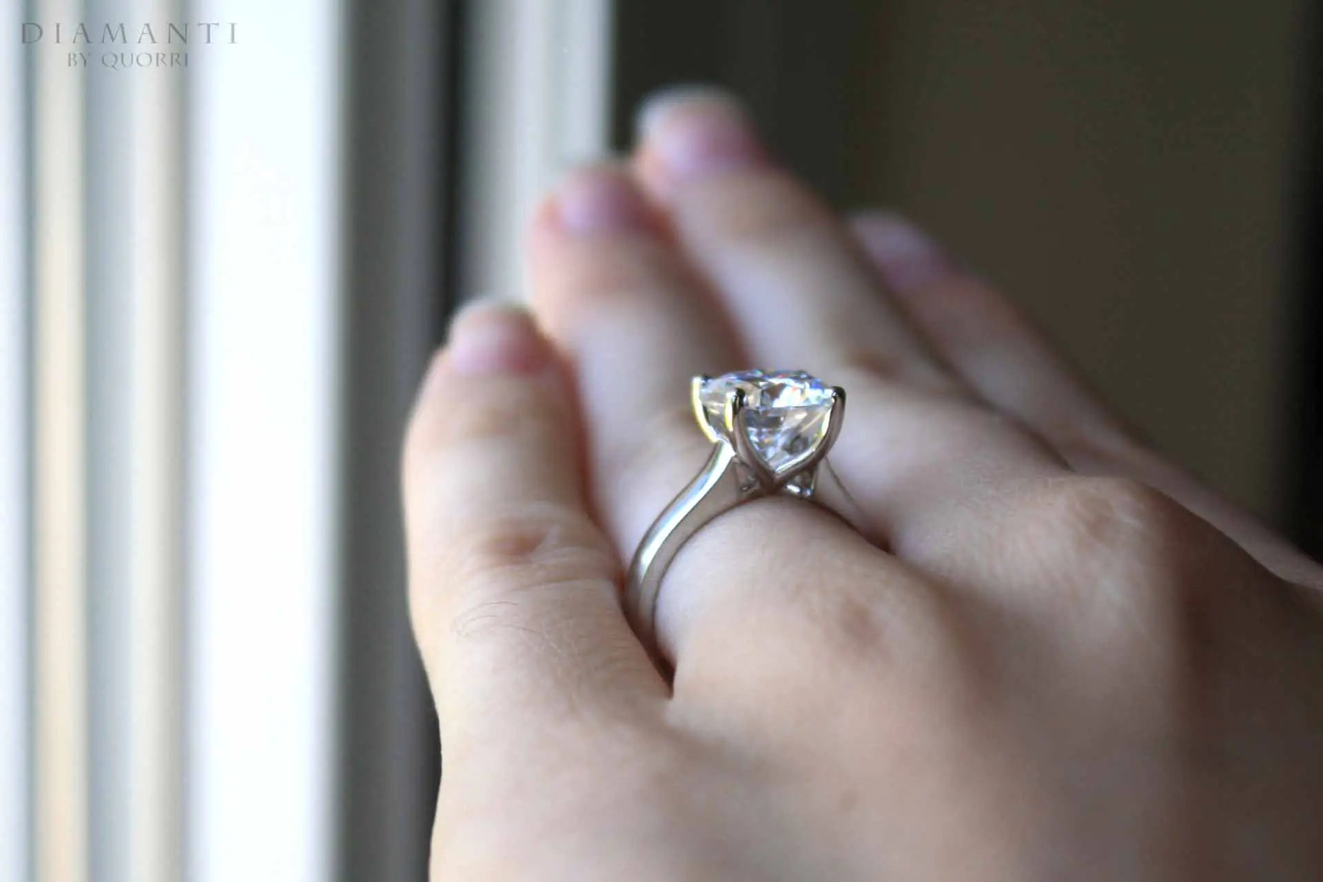 low cost gold and platinum lab made diamond solitaire engagement ring