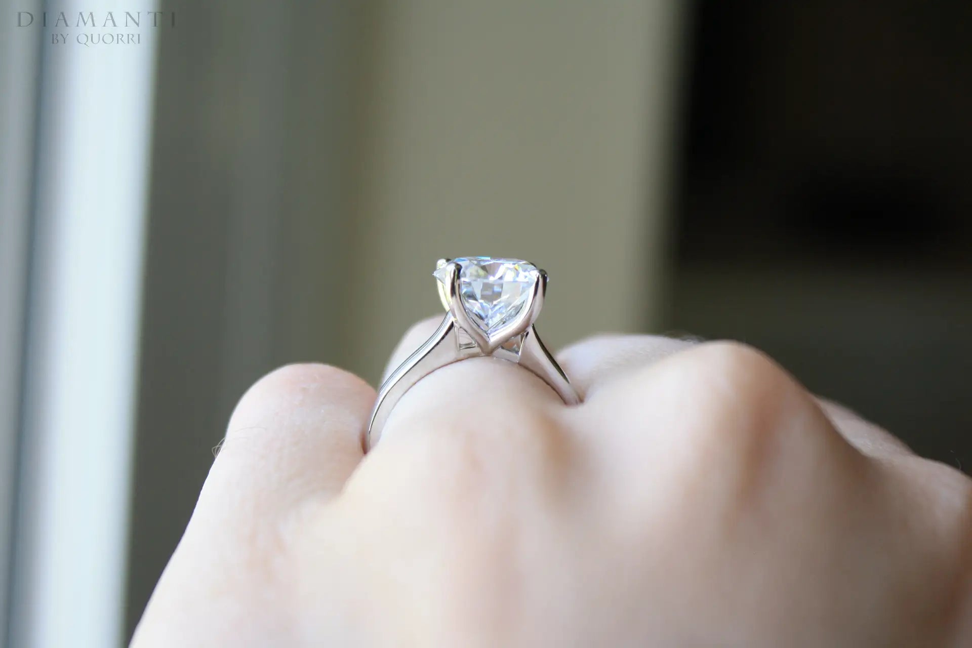 4 carat round four prong white gold lab grown diamond solitaire engagement ring