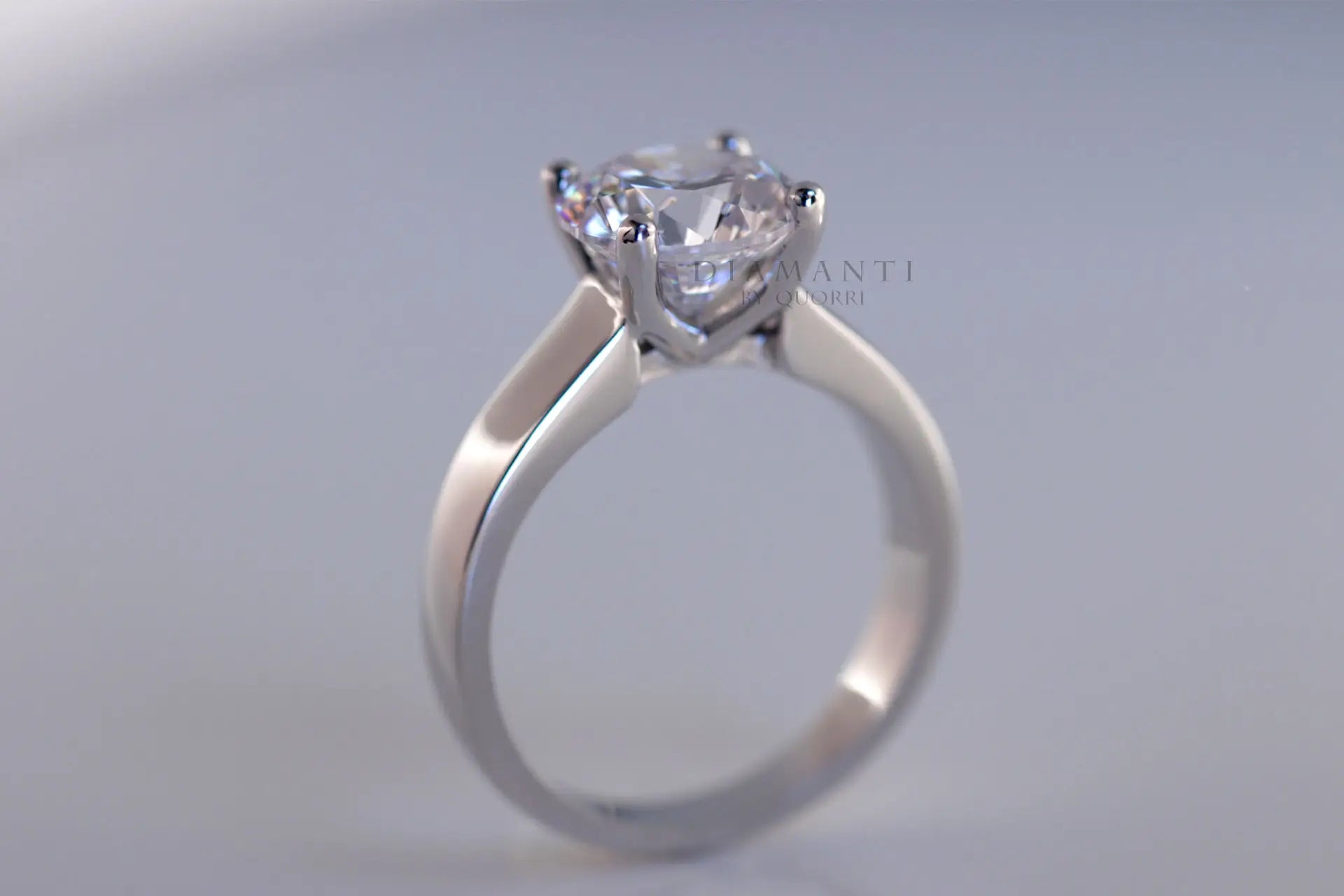 affordable round four prong white gold lab diamond solitaire engagement ring