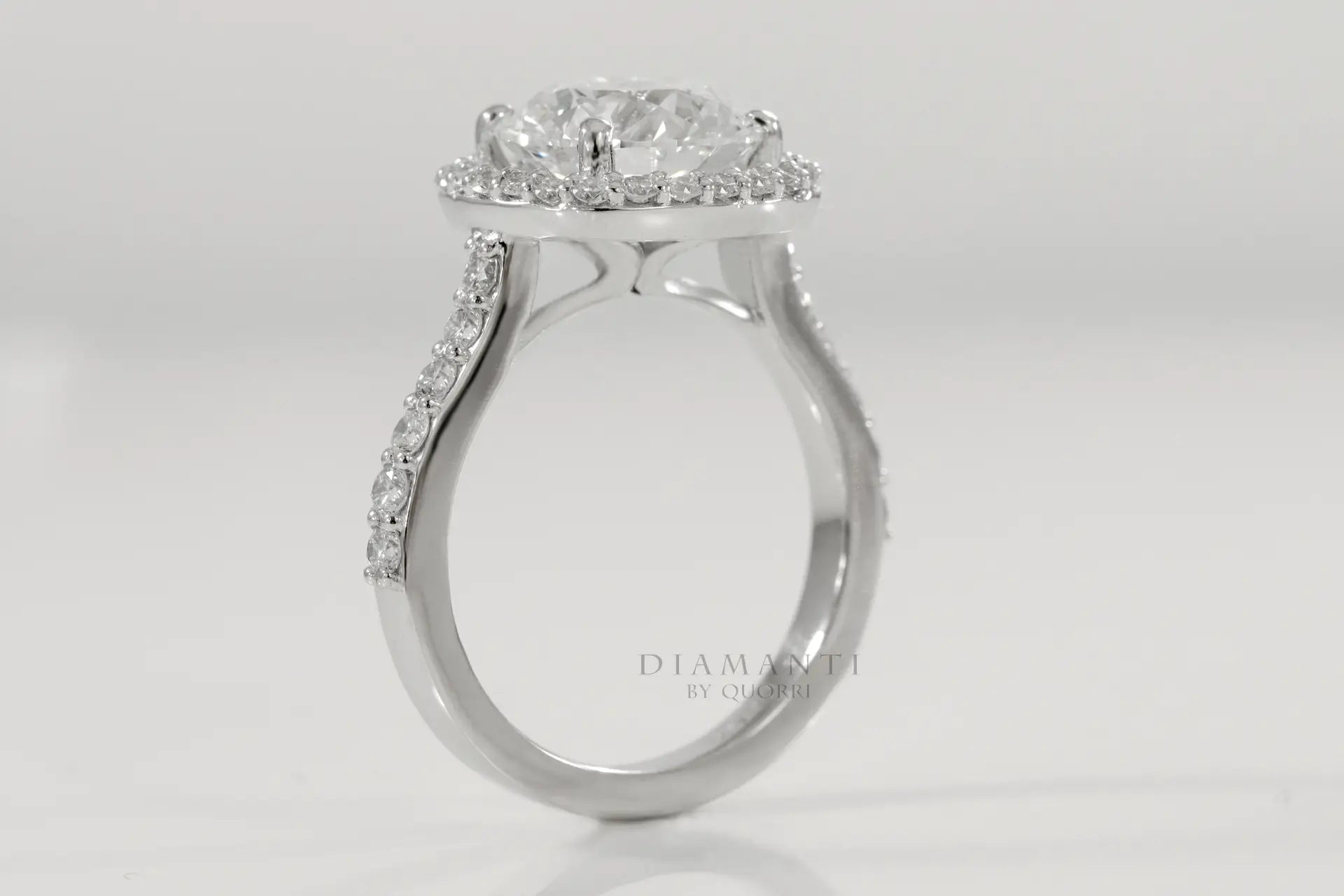 affordable discount white gold accented halo 3 carat lab diamond engagement rings Quorri Canada