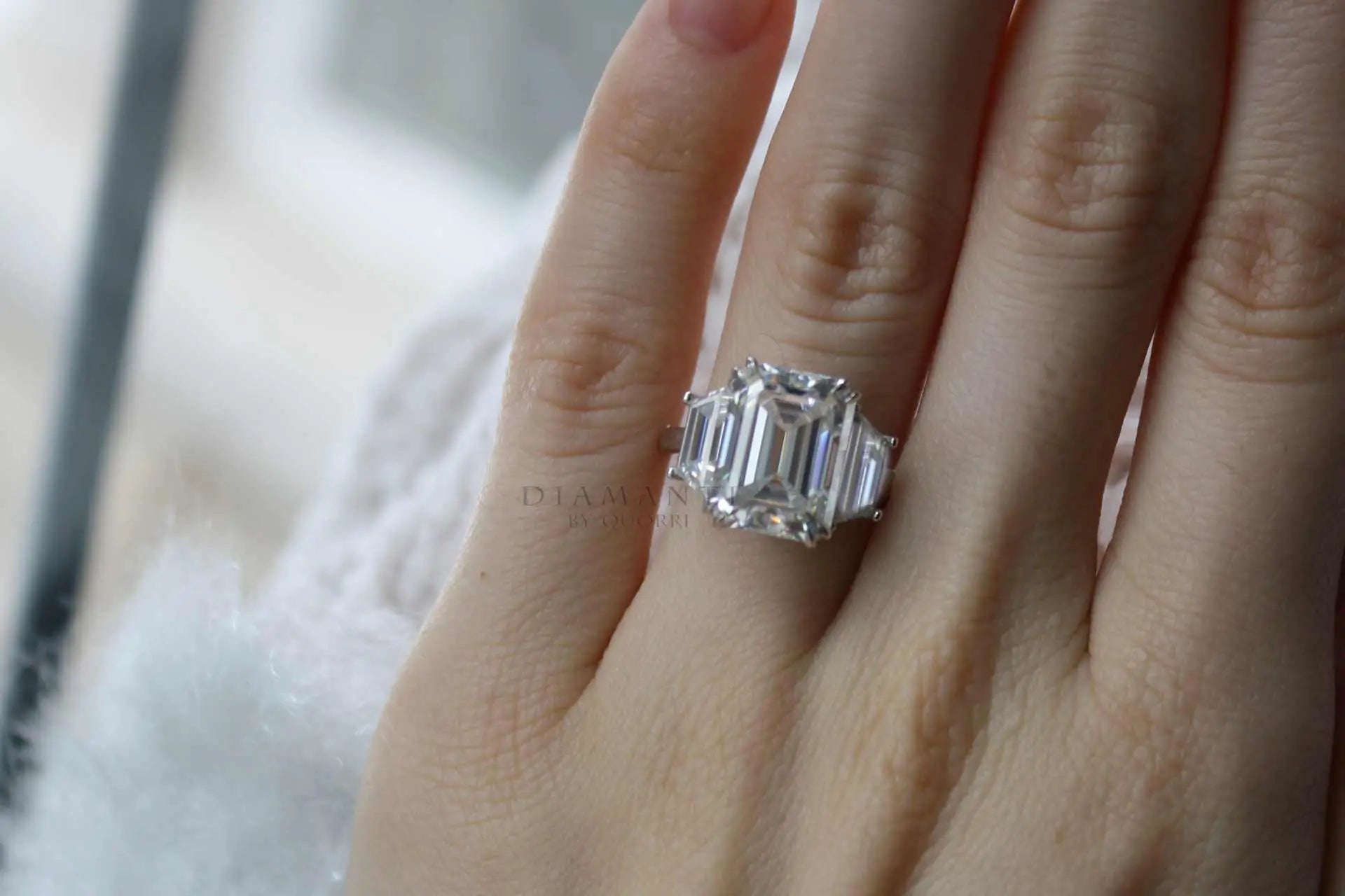 dual claw 5 carat emerald and trapezoid three stone platinum lab created diamond engagement ring quorri