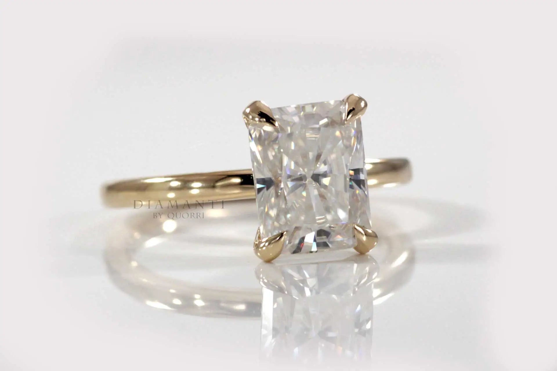 affordable claw prong yellow gold radiant lab diamond engagement ring Quorri