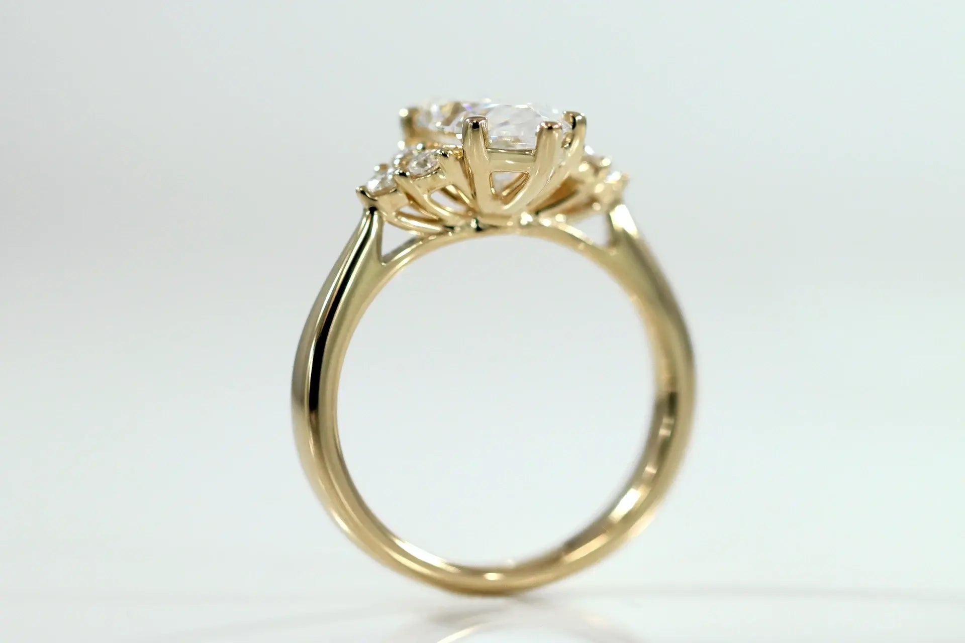 14k yellow gold 2 carat marquise and round accented lab diamond engagement rings at Quorri