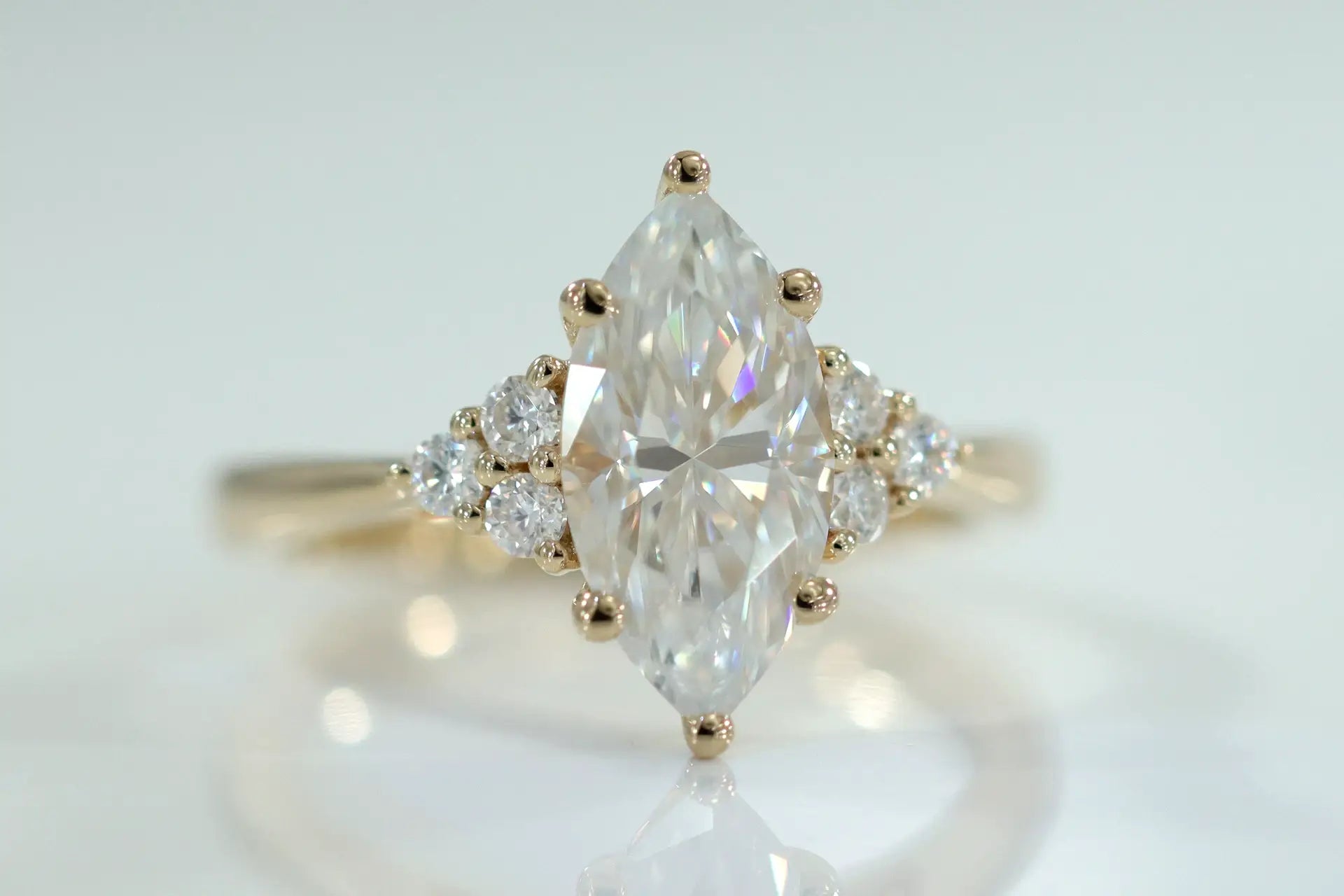 18k yellow gold 4 carat marquise and round accented lab diamond engagement ring Quorri