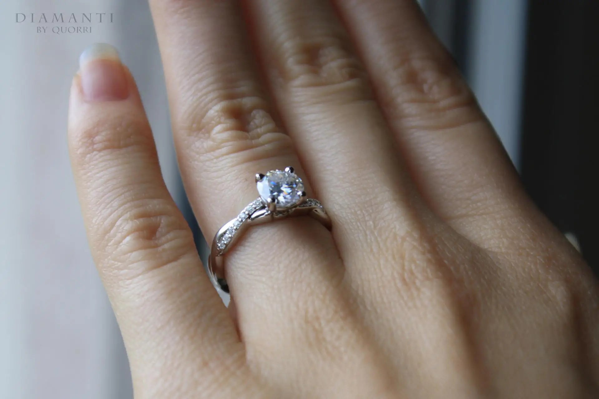1 carat accented crisscross band round lab diamond engagement ring Quorri Canada