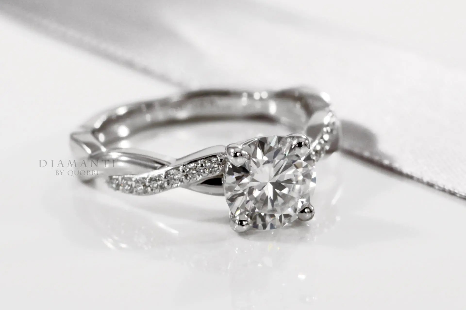 accented crisscross band round lab diamond engagement ring
