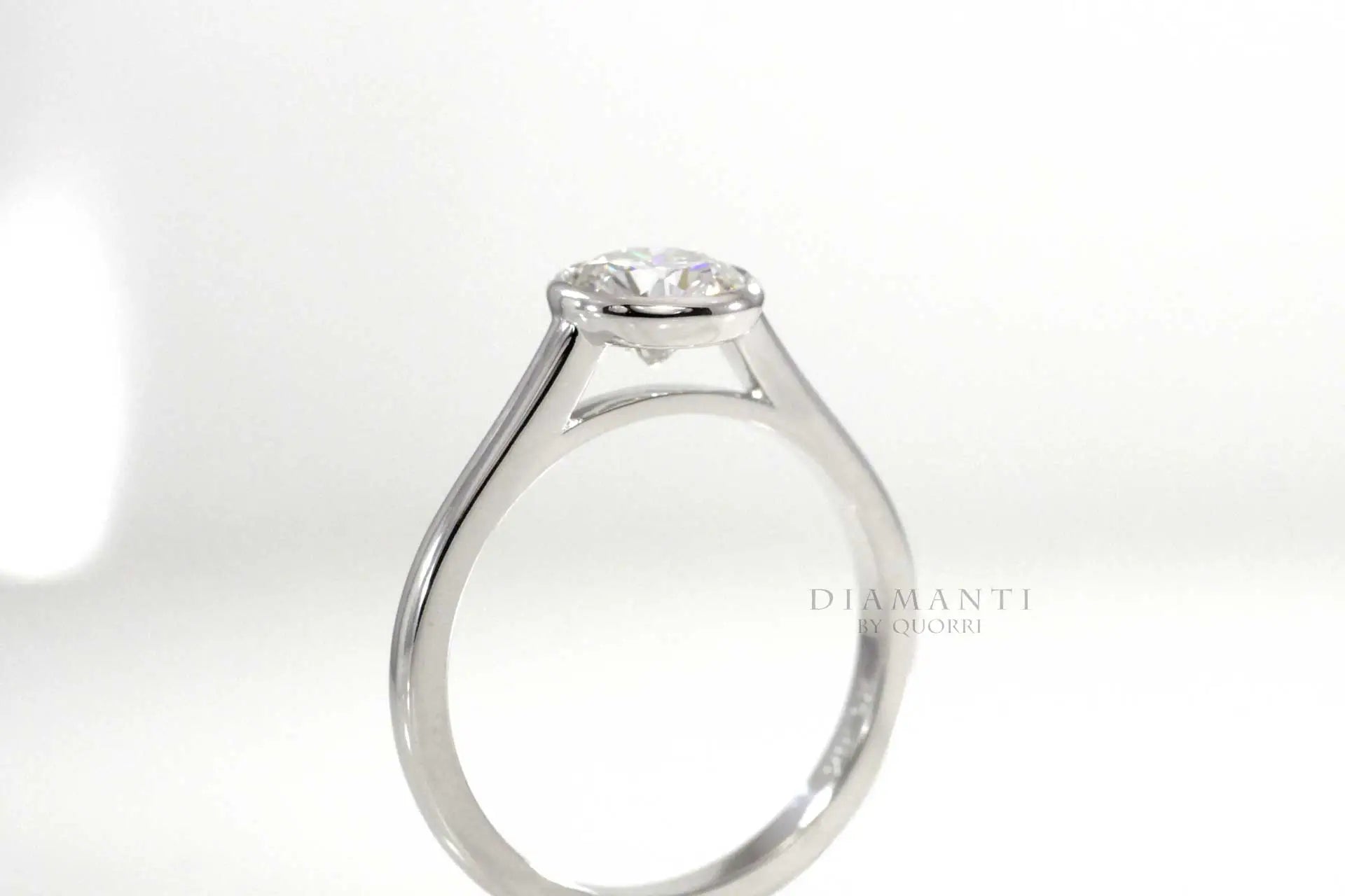 white gold bezel set round lab diamond engagement ring Quorri