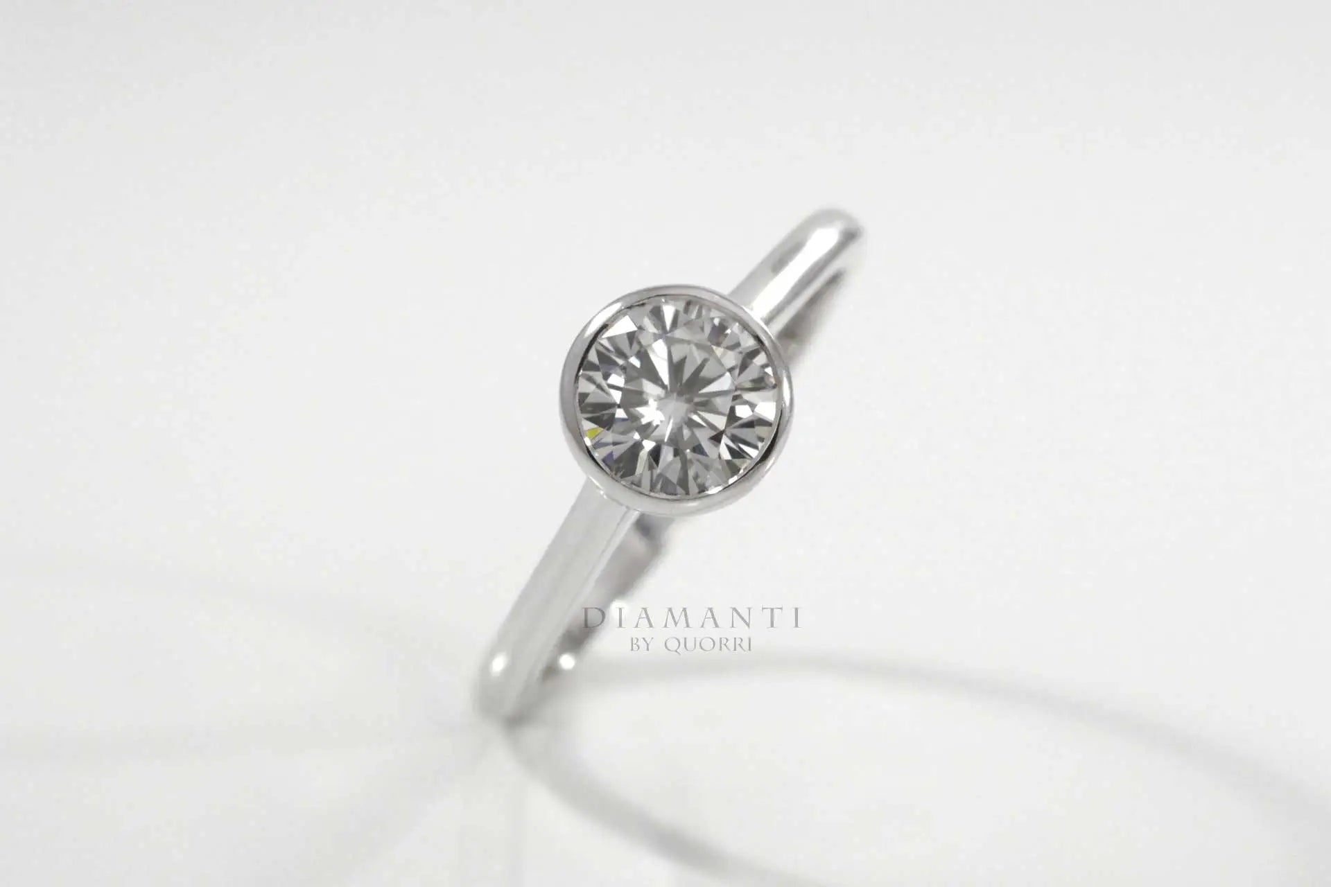 platinum bezel set 1.5ct round lab grown diamond engagement ring Quorri