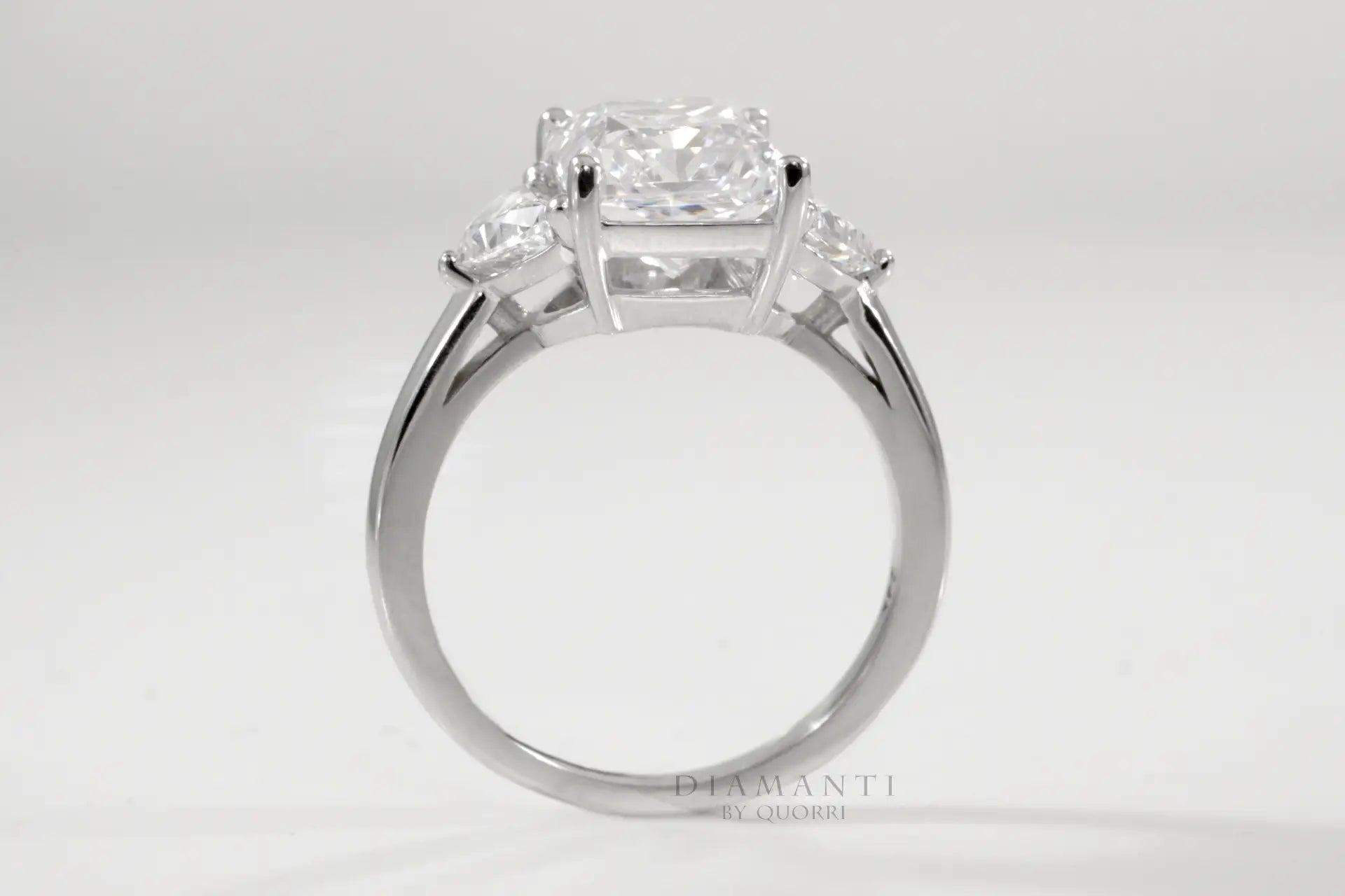 3 carat white gold designer three-stone radiant and half moon lab diamond engagement ring Quorri