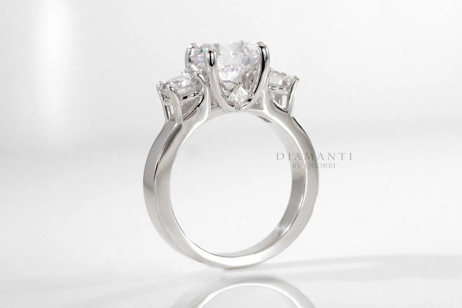 white gold three stone round brilliant lab diamond engagement ring Quorri