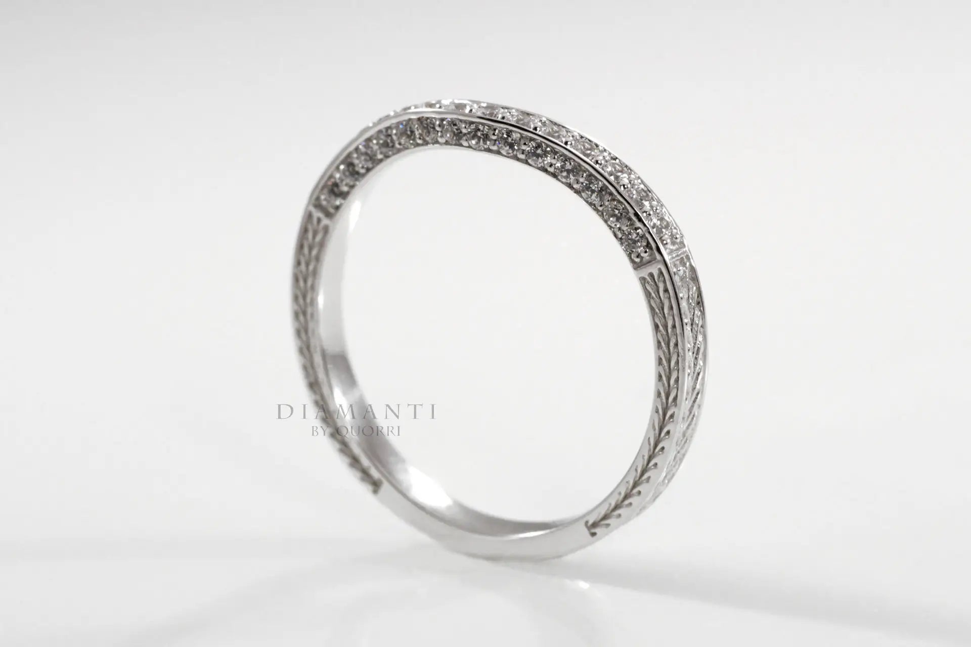 hand engraved white gold antique round accented lab diamond wedding band at Quorri