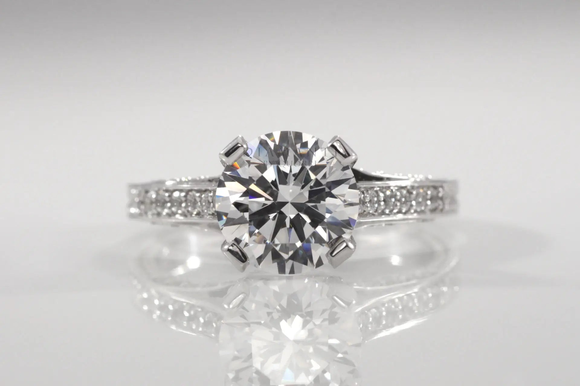 four prong hand scrolled accented round lab diamond engagement ring