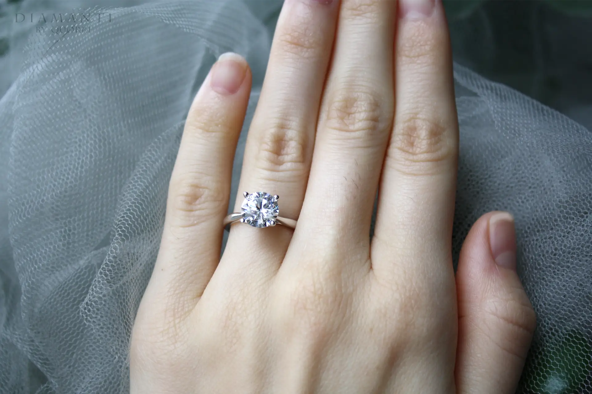 affordable round brilliant lab made diamond solitaire engagement ring