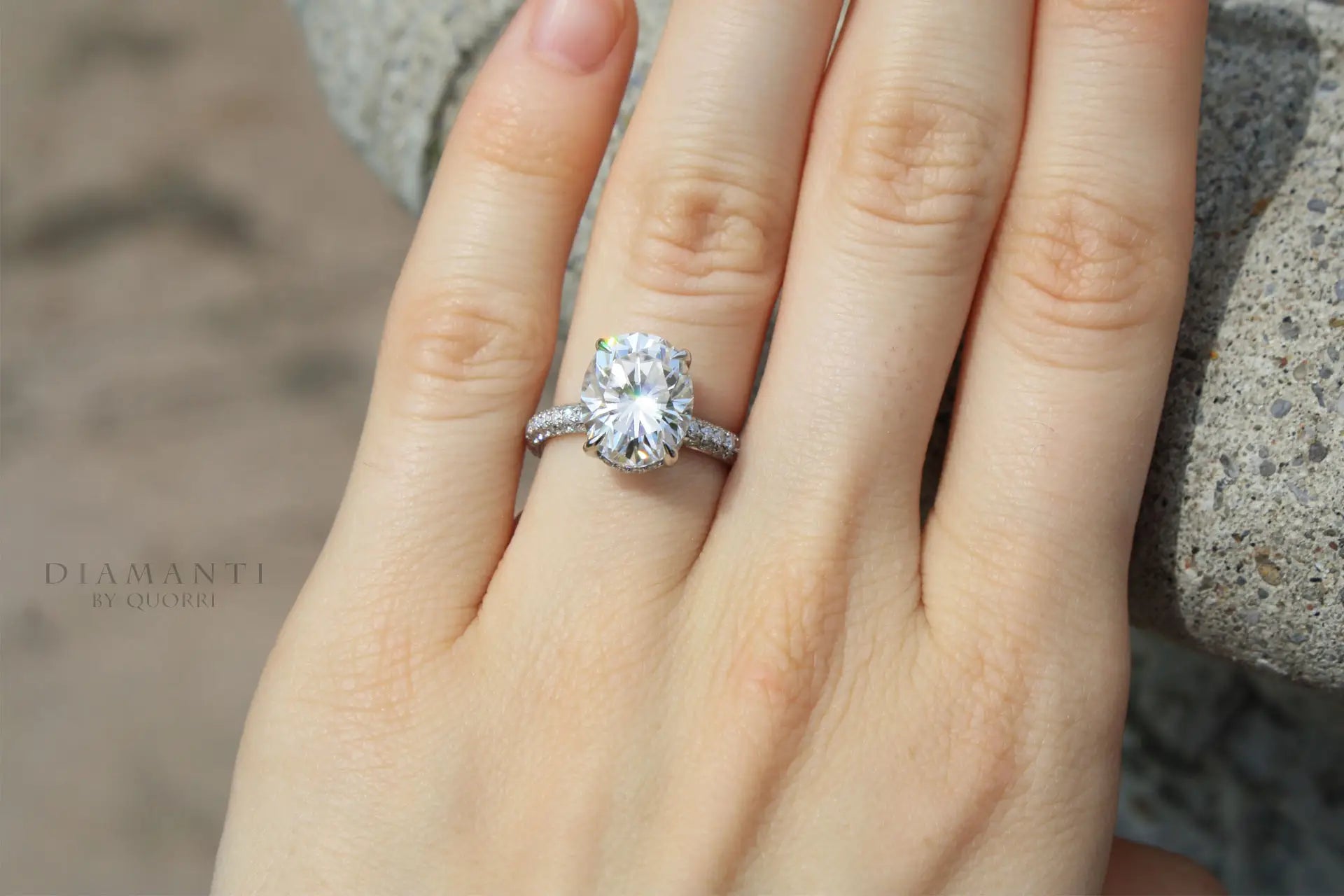 platinum 4 carat oval lab diamond claw prong three sided band engagement ring Quorri