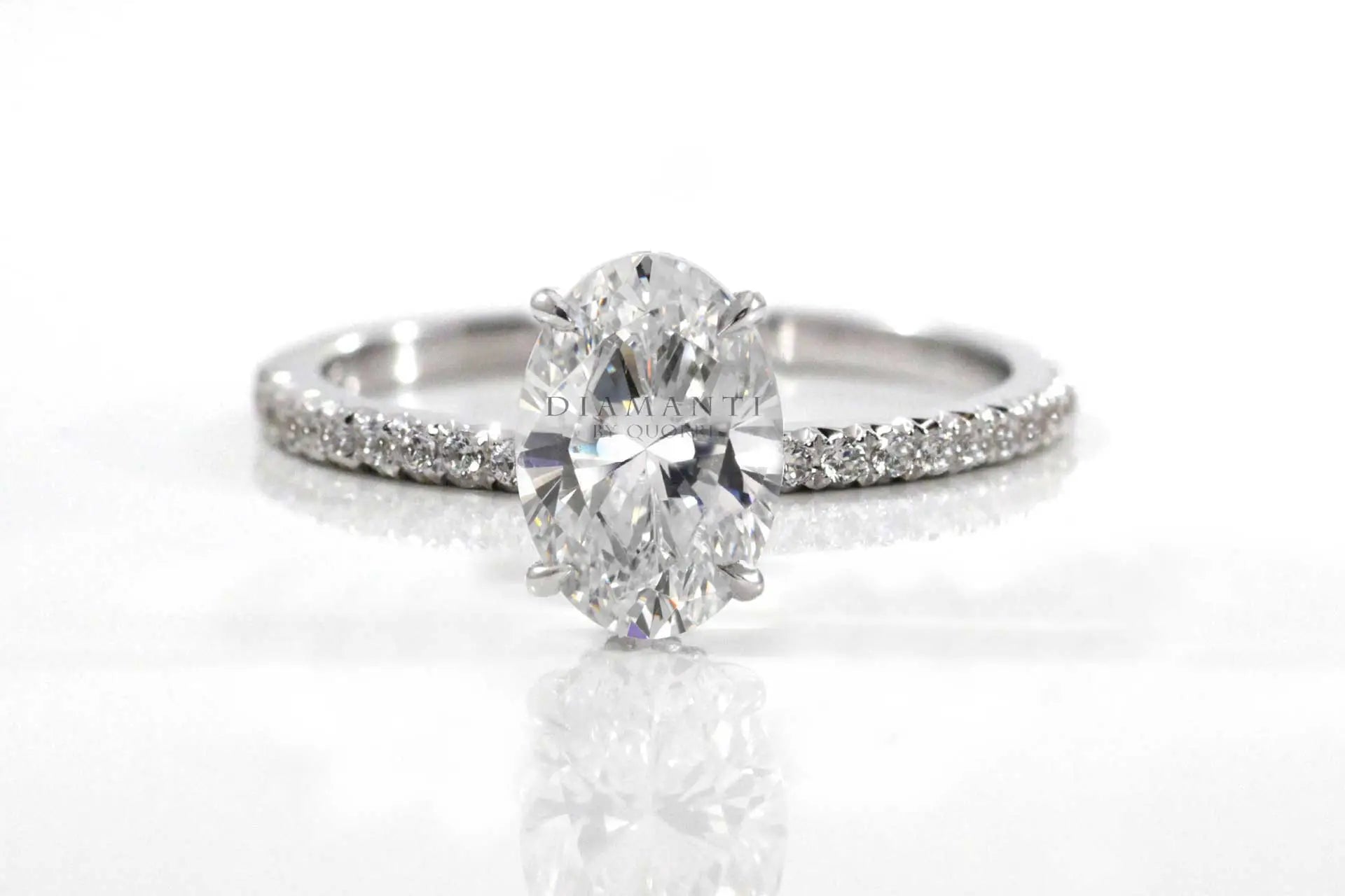claw prong accented oval lab diamond engagement ring Quorri