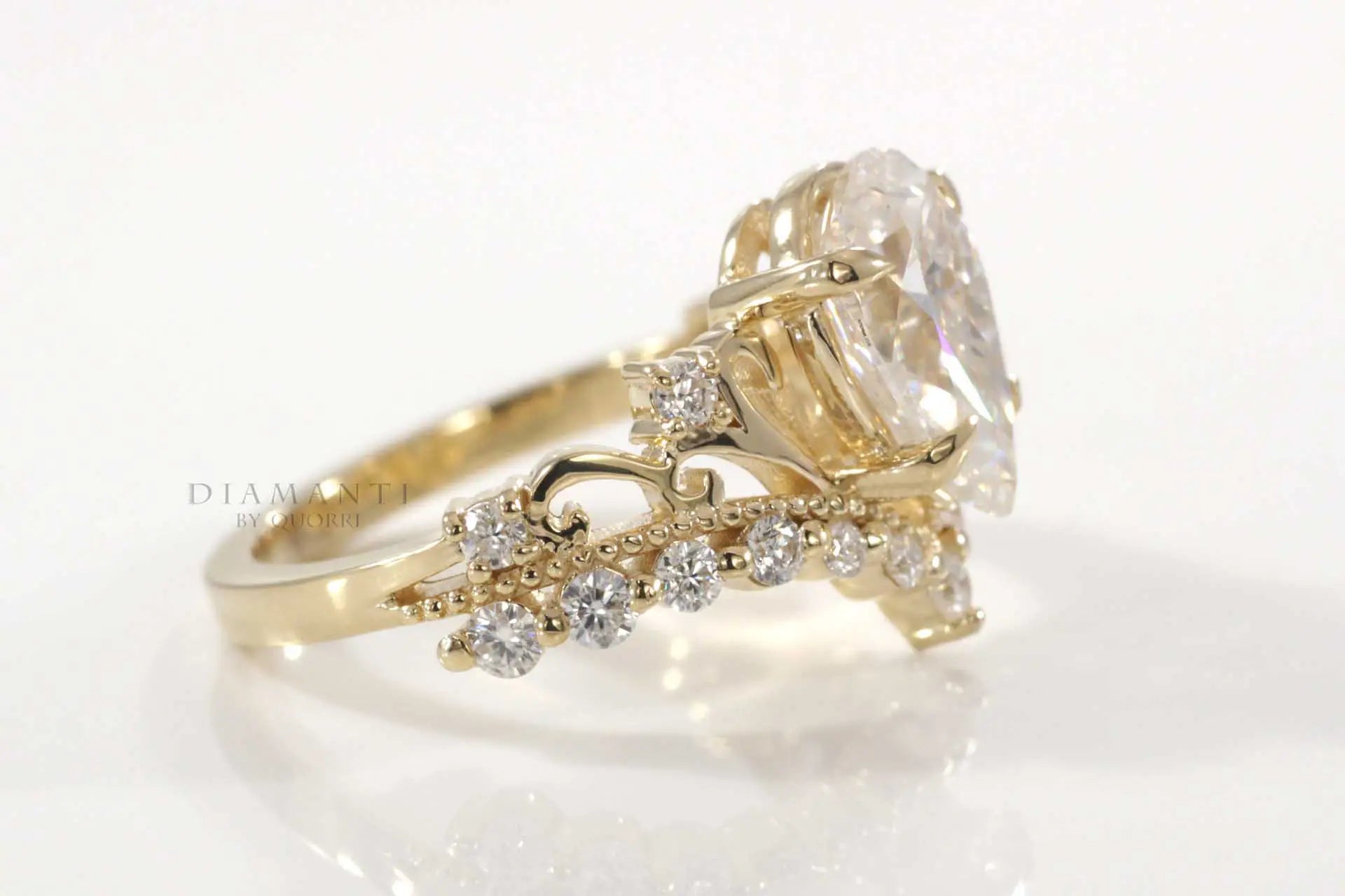 18k yellow gold designer vintage claw prong 3 carat pear lab diamond engagement ring Quorri