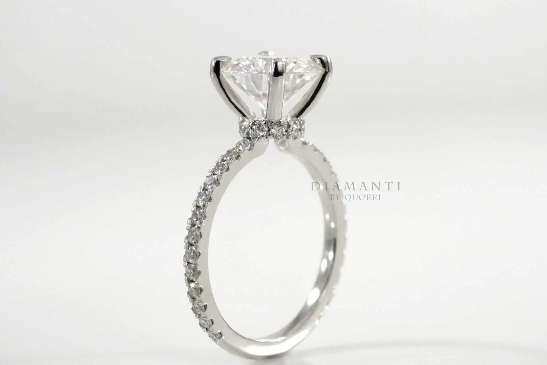 white gold four claw prong 2 carat round lab diamond accented engagement ring Quorri