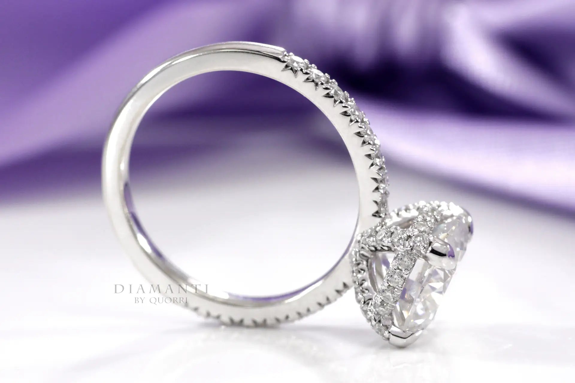 whtie gold accented claw prong and under-halo round lab diamond engagement ring