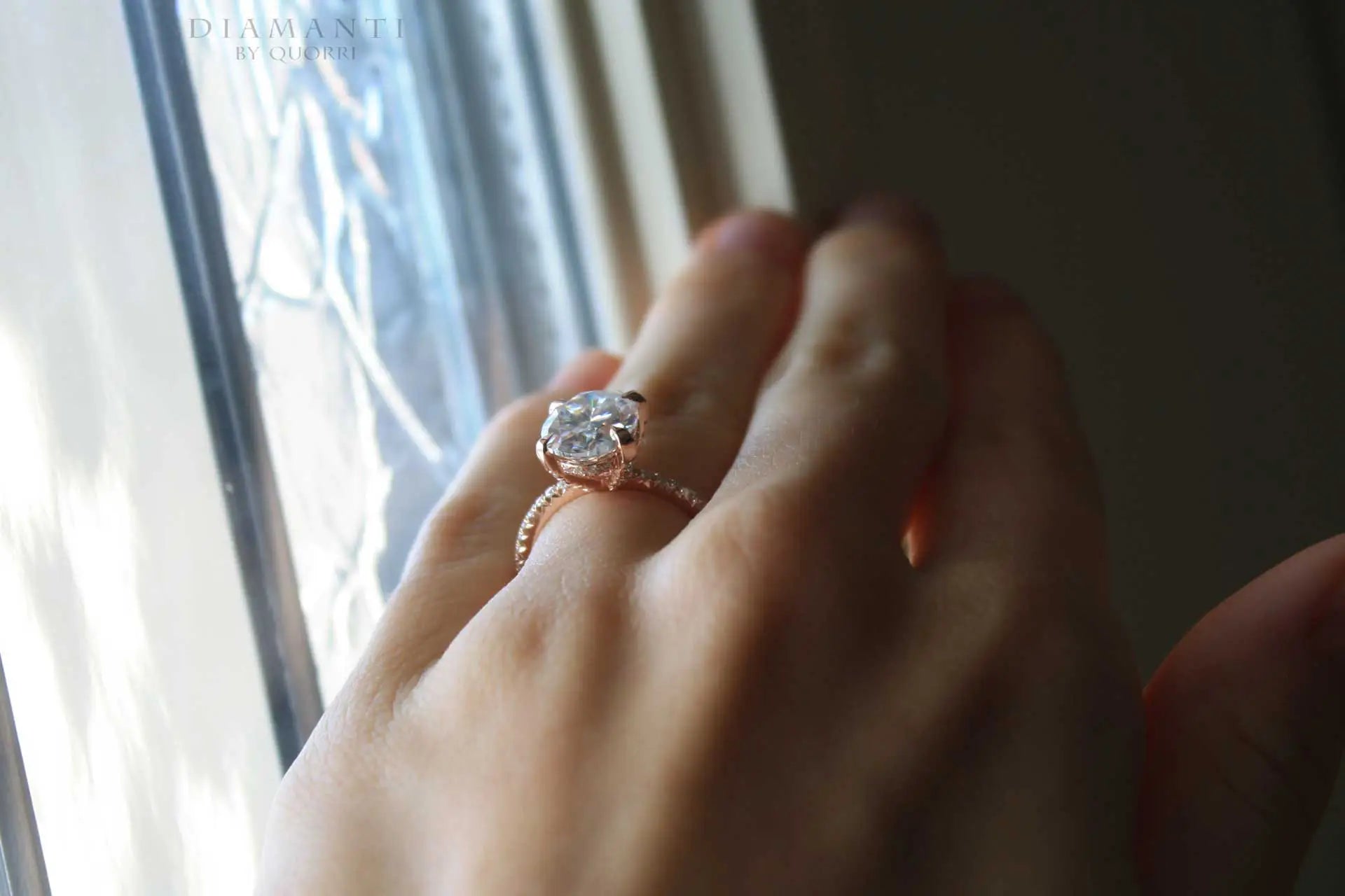 rose gold accented claw prong and under-halo round lab created diamond engagement ring