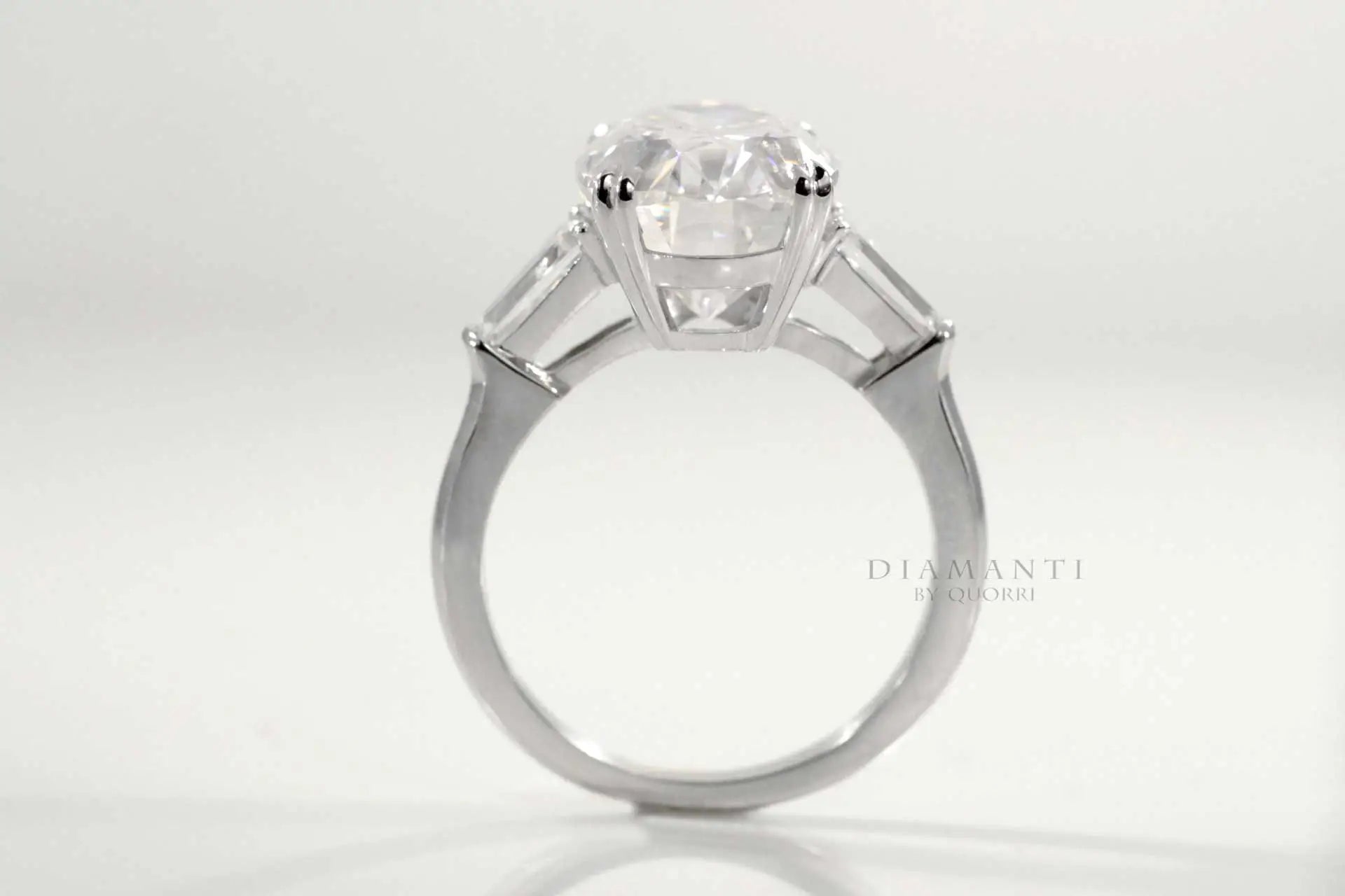 18k white gold dual claw oval three stone lab grown diamond engagement ring Quorri