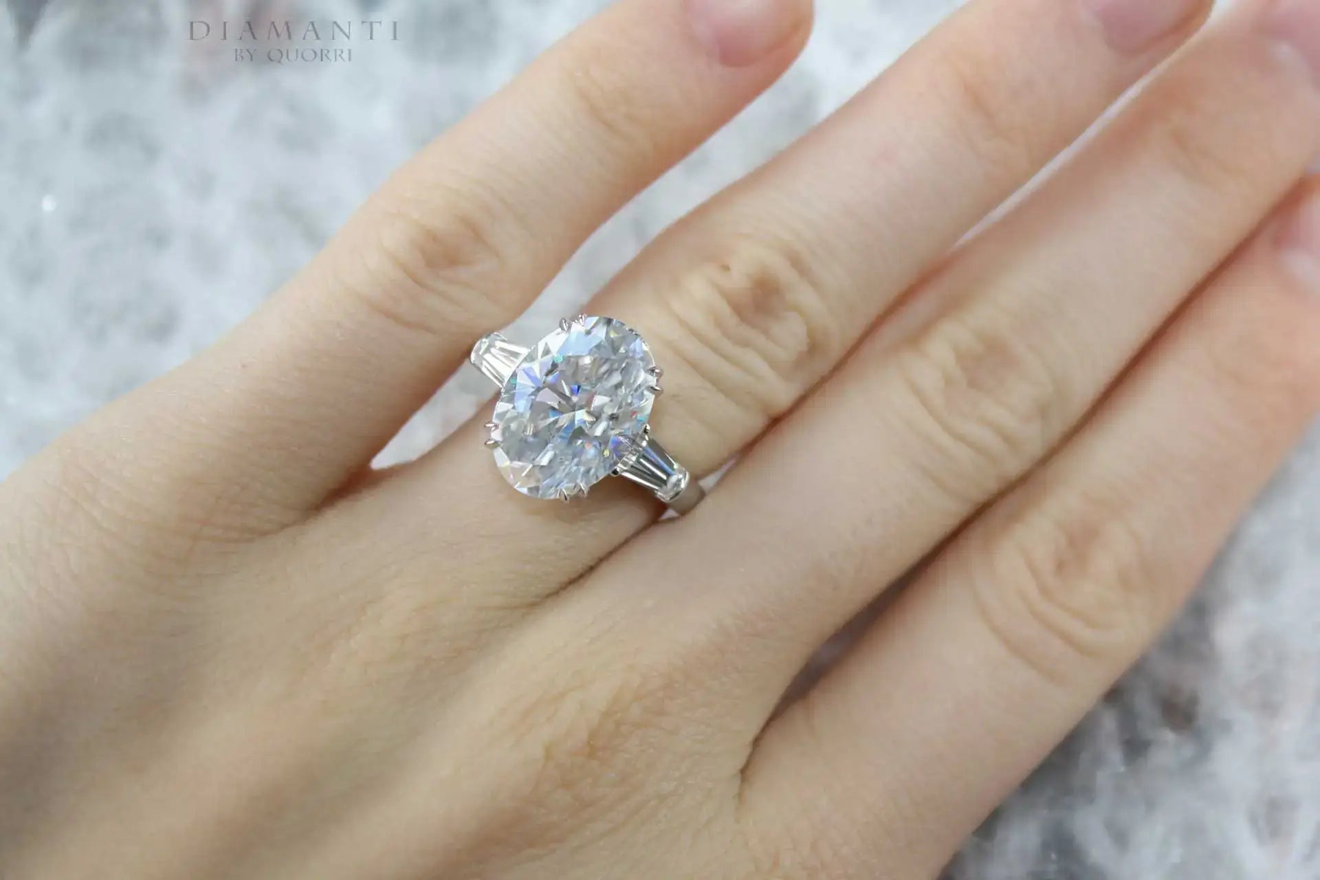 platinum dual claw 4 carat oval three stone lab diamond engagement ring Quorri