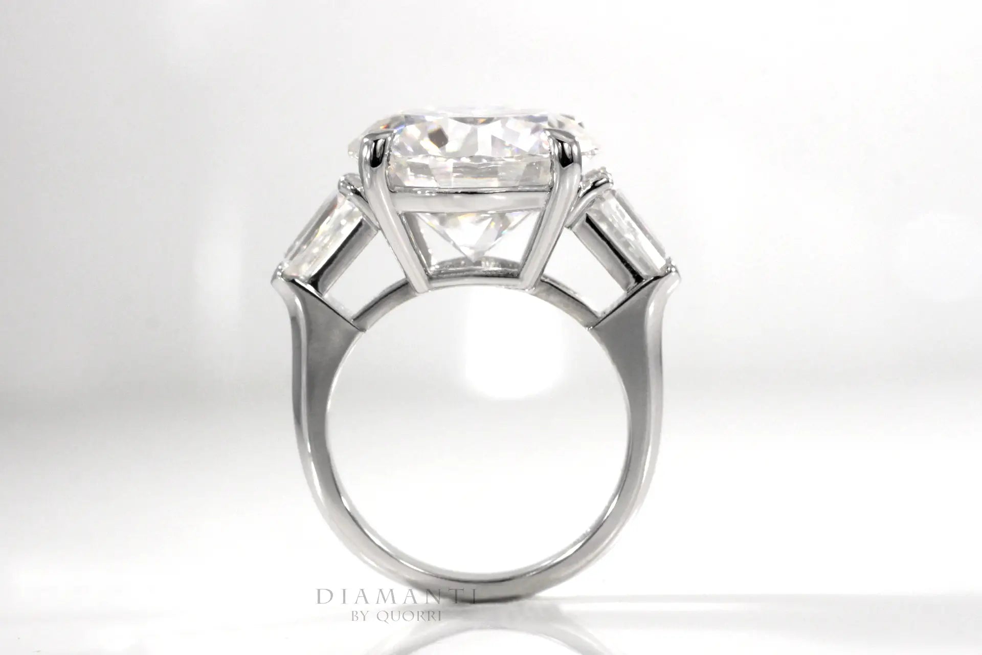 18k white gold claw prong 6 carat round and baguette three stone lab diamond engagement ring Quorri