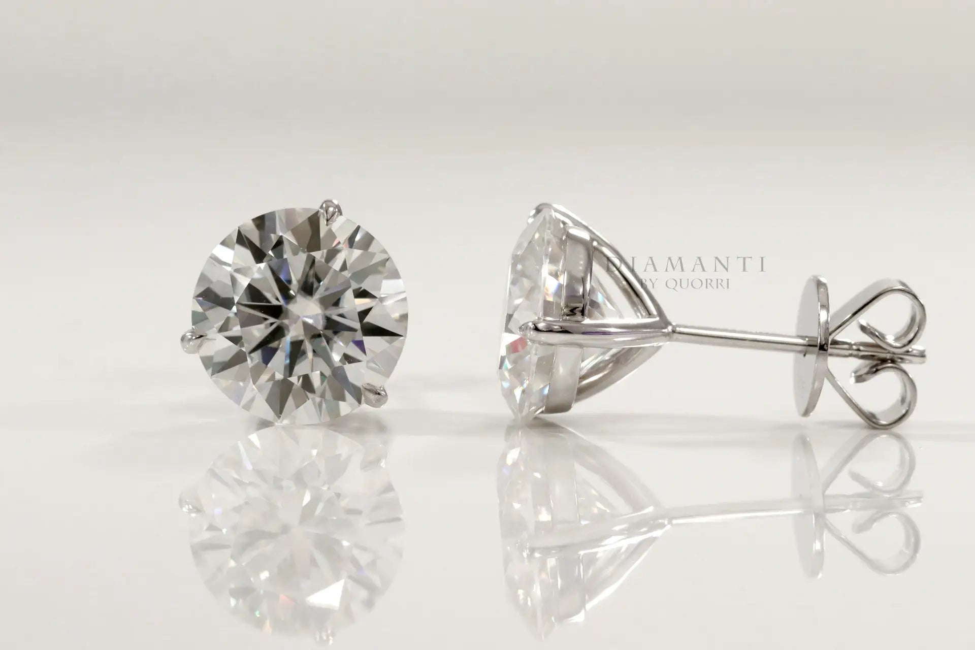 designer platinum three prong round martini lab diamond stud earrings Quorri