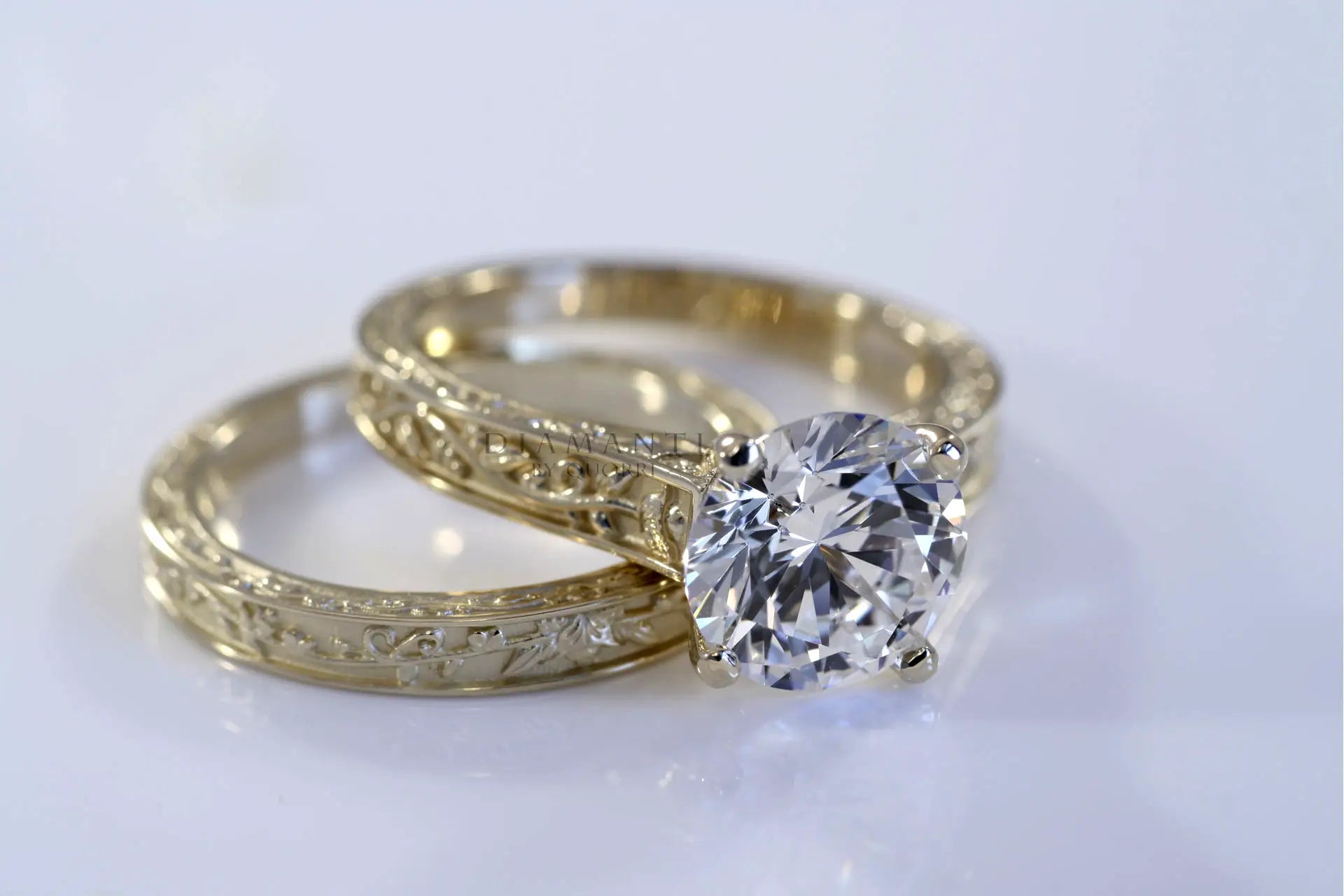 yellow gold antique rose motif round lab diamond engagement ring and wedding band