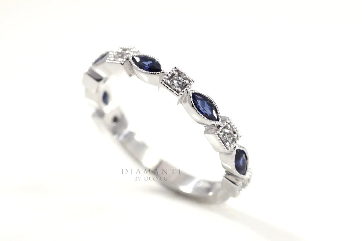 designer white gold blue marquise sapphires and round diamond wedding ring Quorri Canada
