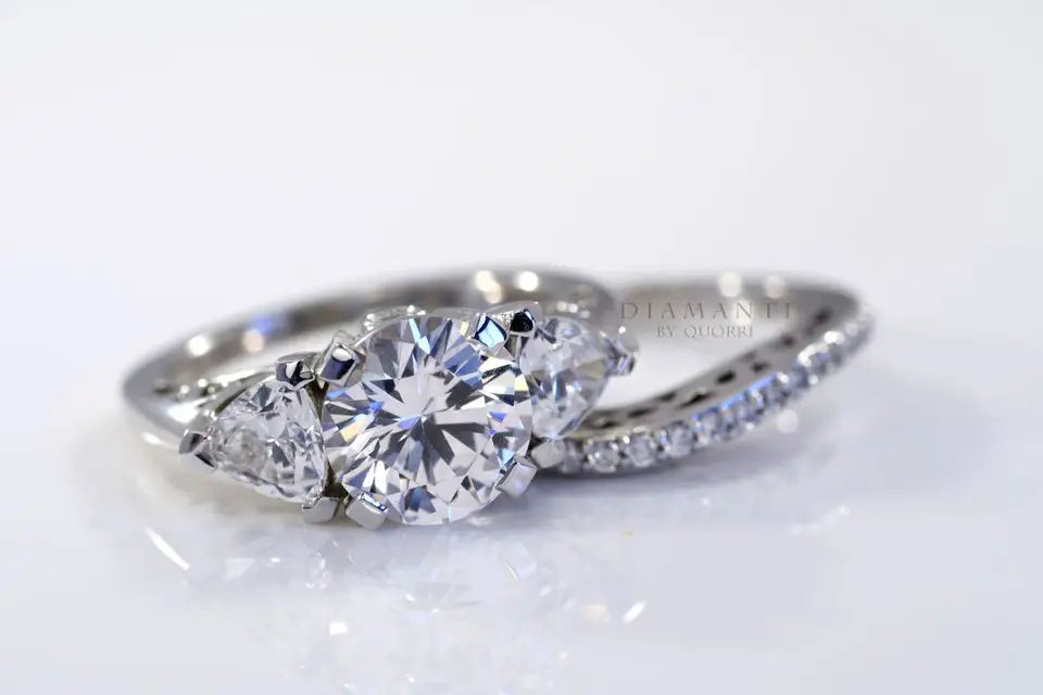 affordable hand engraved 2ct three stone round accented lab diamond wedding ring set Quorri