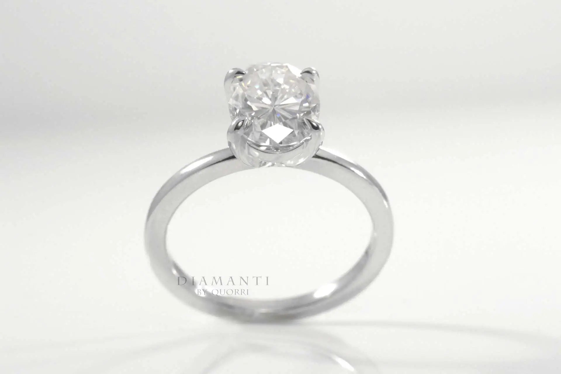 platinum 4 claw prong oval lab diamond engagement ring Quorri