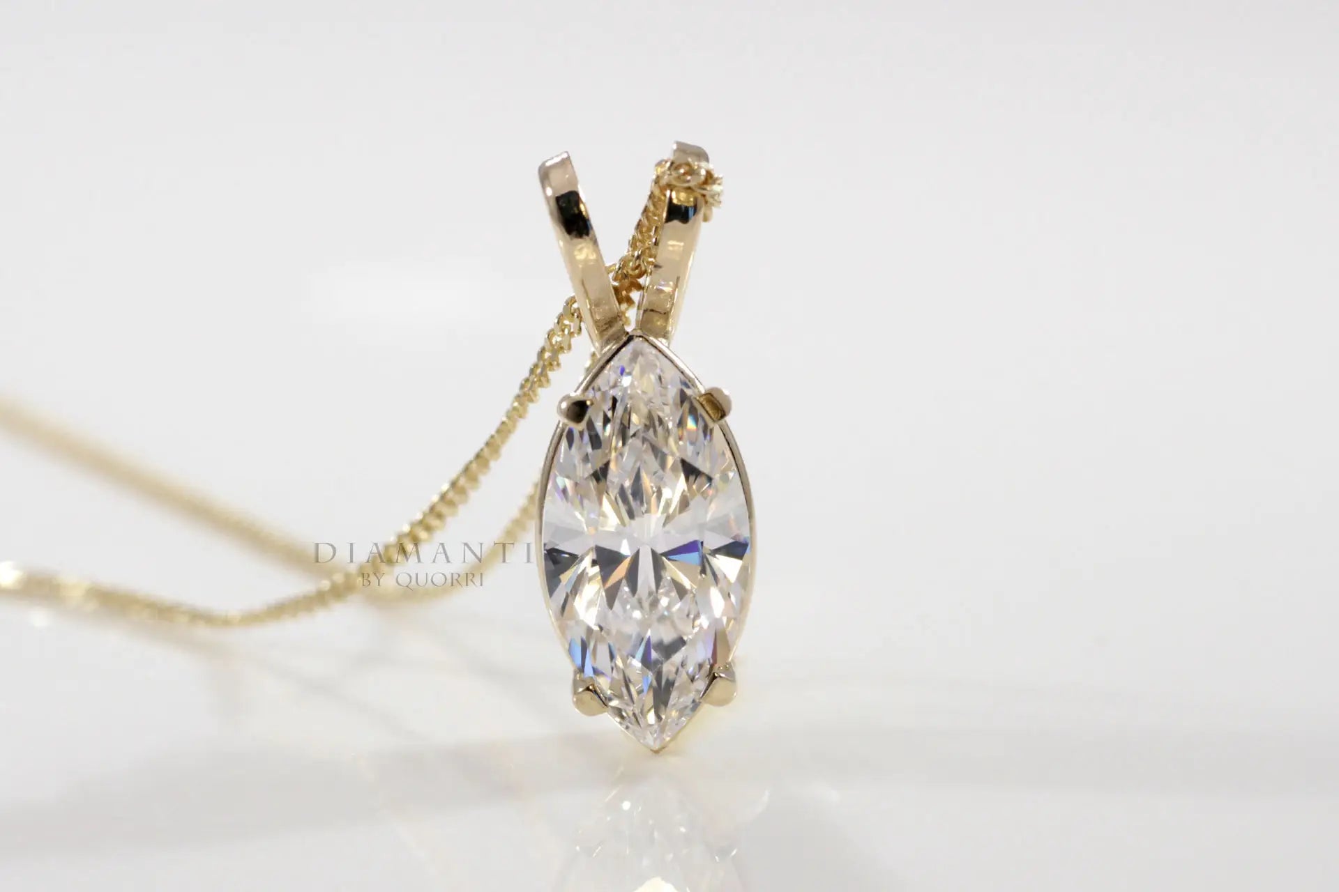 18k yellow gold designer marquise lab grown diamond solitaire pendant Quorri