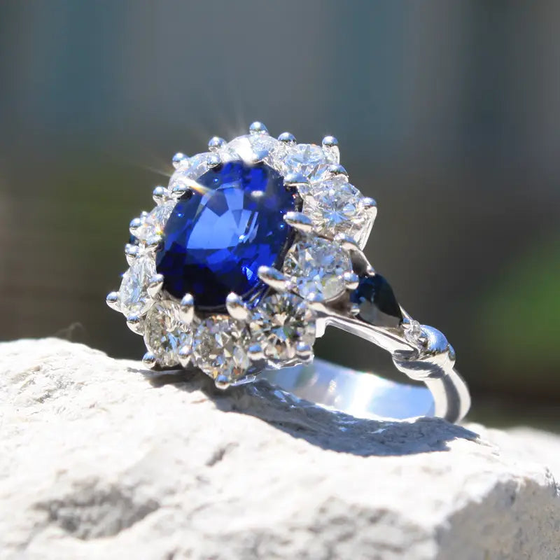 ten claw prong halo split shank cultured lab grown blue sapphire engagement ring