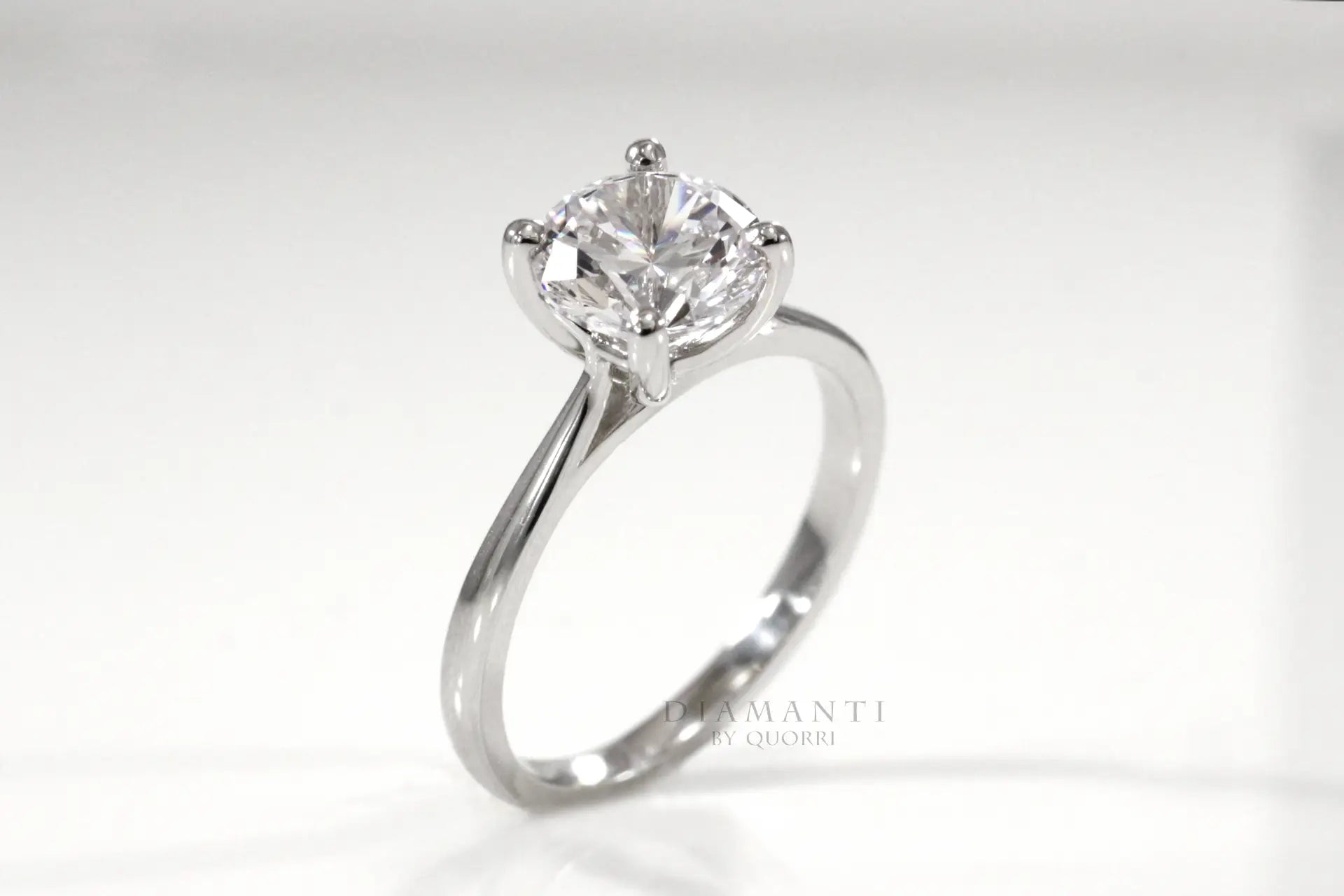 affordable 4 prong 18k white gold round lab diamond solitaire engagement ring Quorri