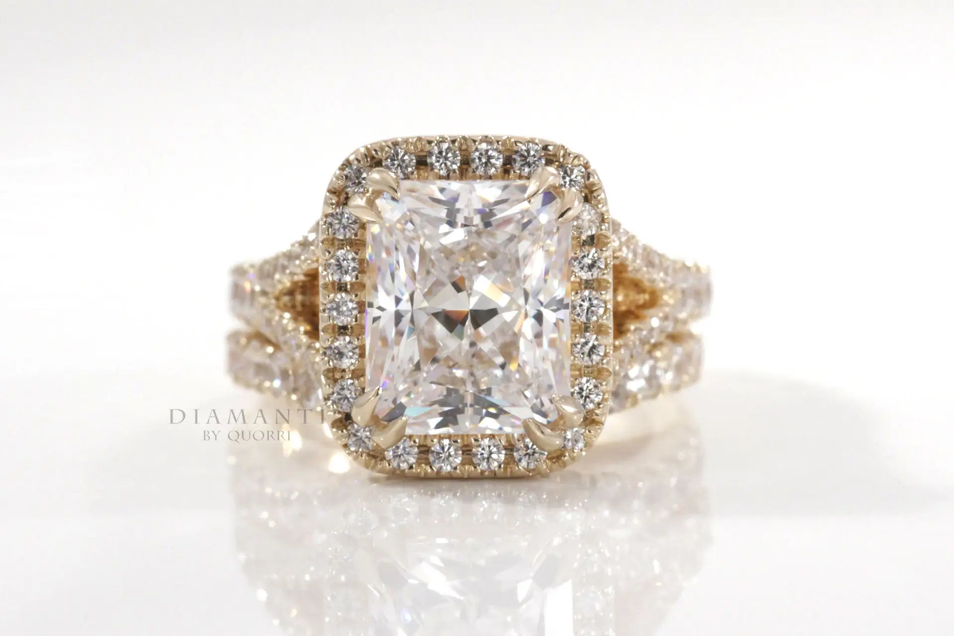 18k yellow gold radiant halo affordable round accented lab diamond engagement and wedding band Quorri