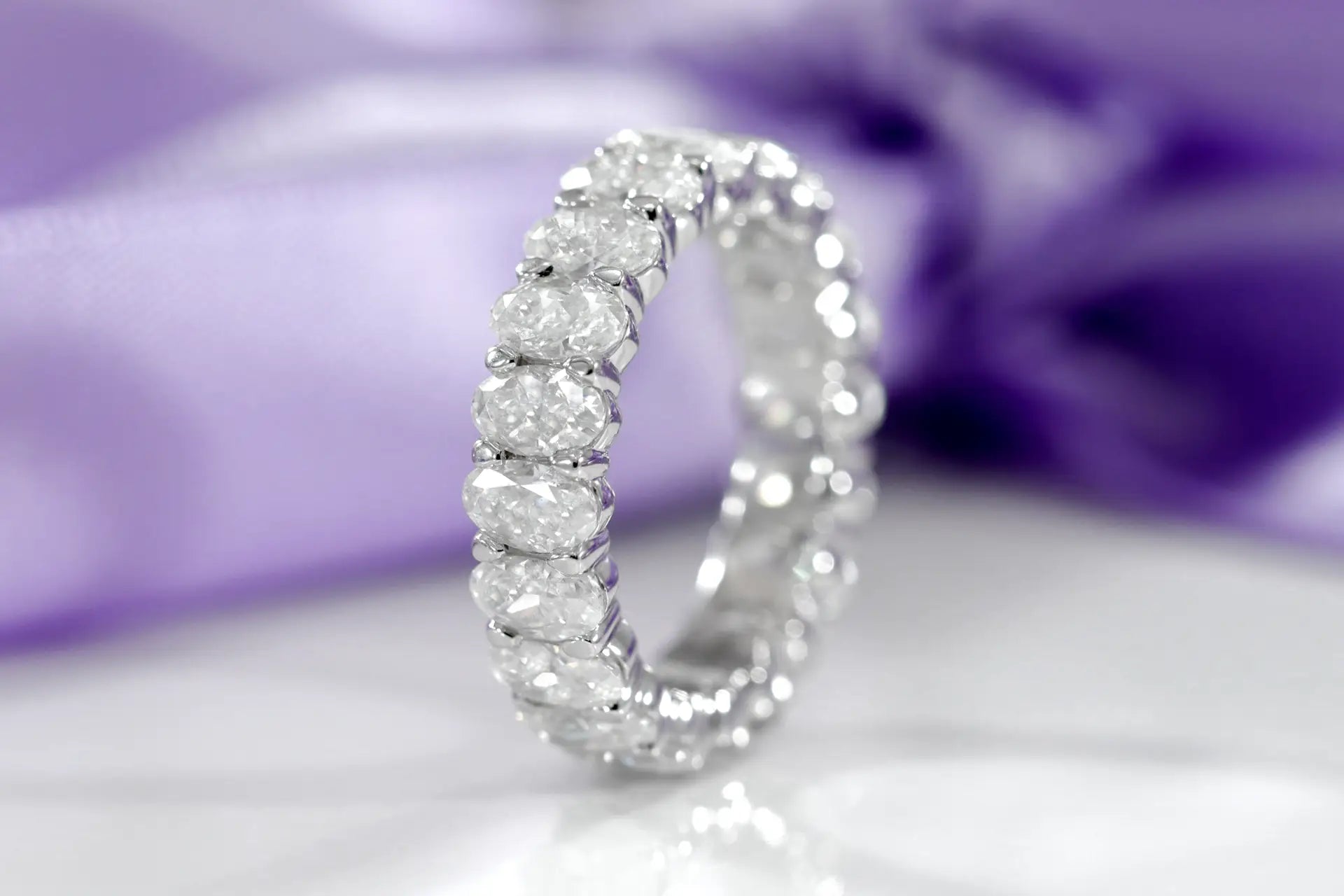 18k white gold 3.5 carat total weight oval lab created diamond eternity wedding and anniversary band Quorri Canada