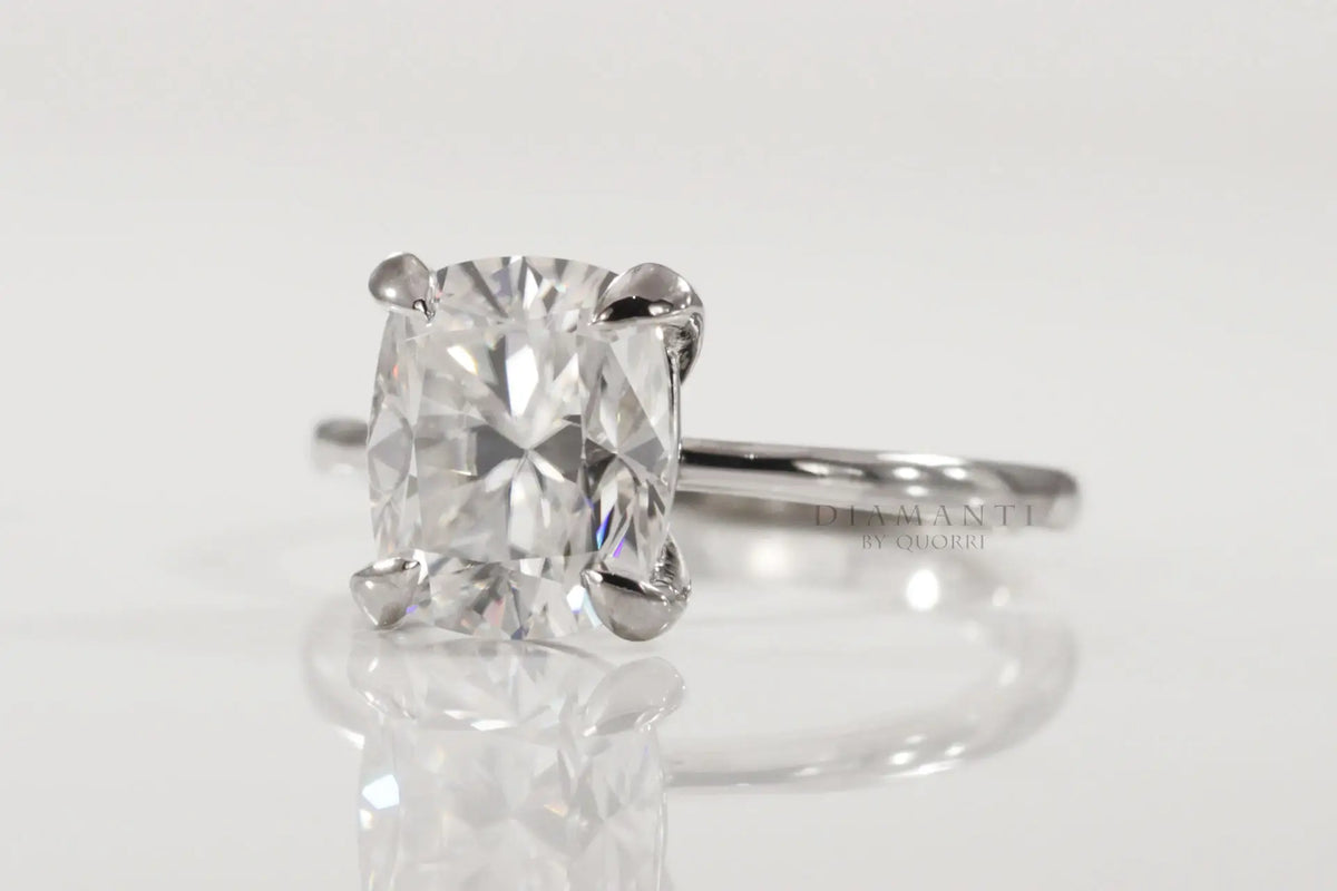 claw prong white gold elongated cushion lab diamond engagement ring Quorri