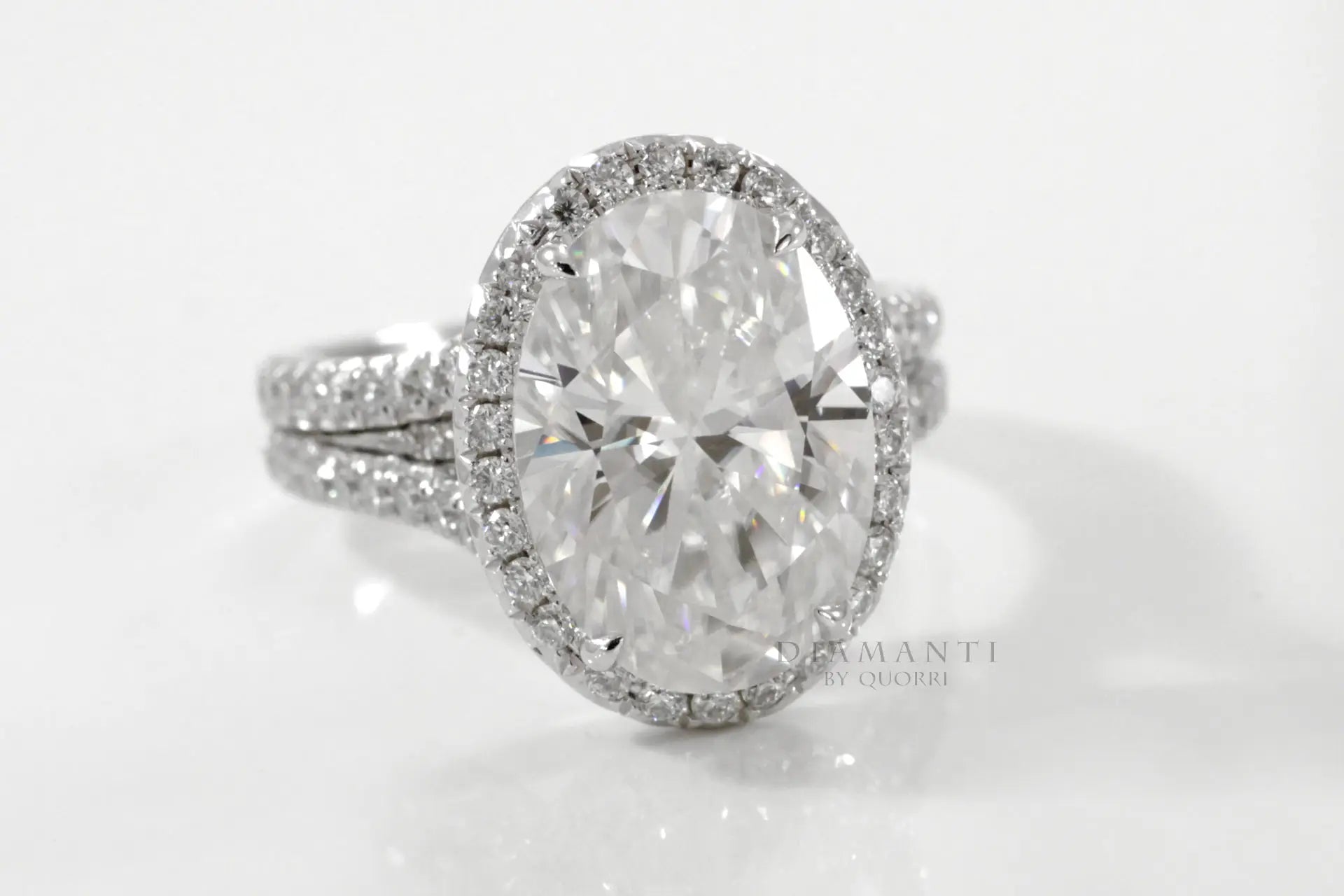 platinum claw prong split band oval halo lab diamond engagement ring 