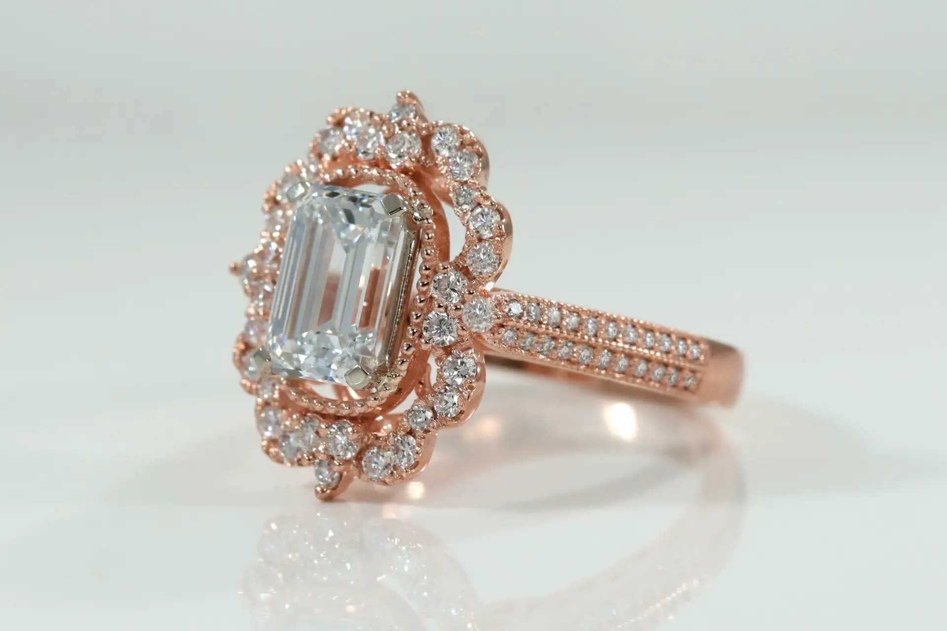 rose gold designer vintage halo 2 carat emerald cut lab diamond engagement ring Quorri