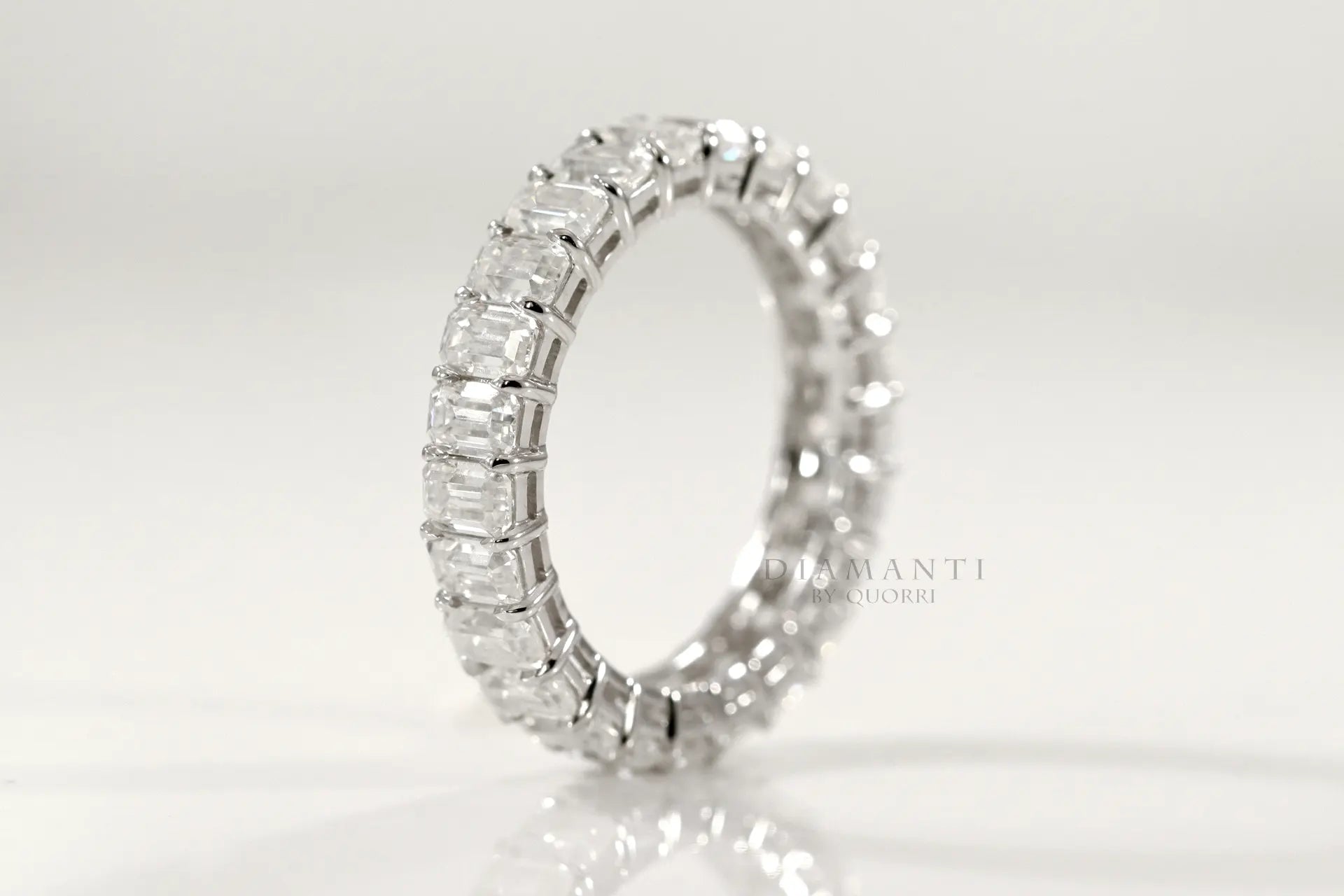 designer 18k white gold 3 carat emerald cut diamond eternity anniversary band Quorri Canada