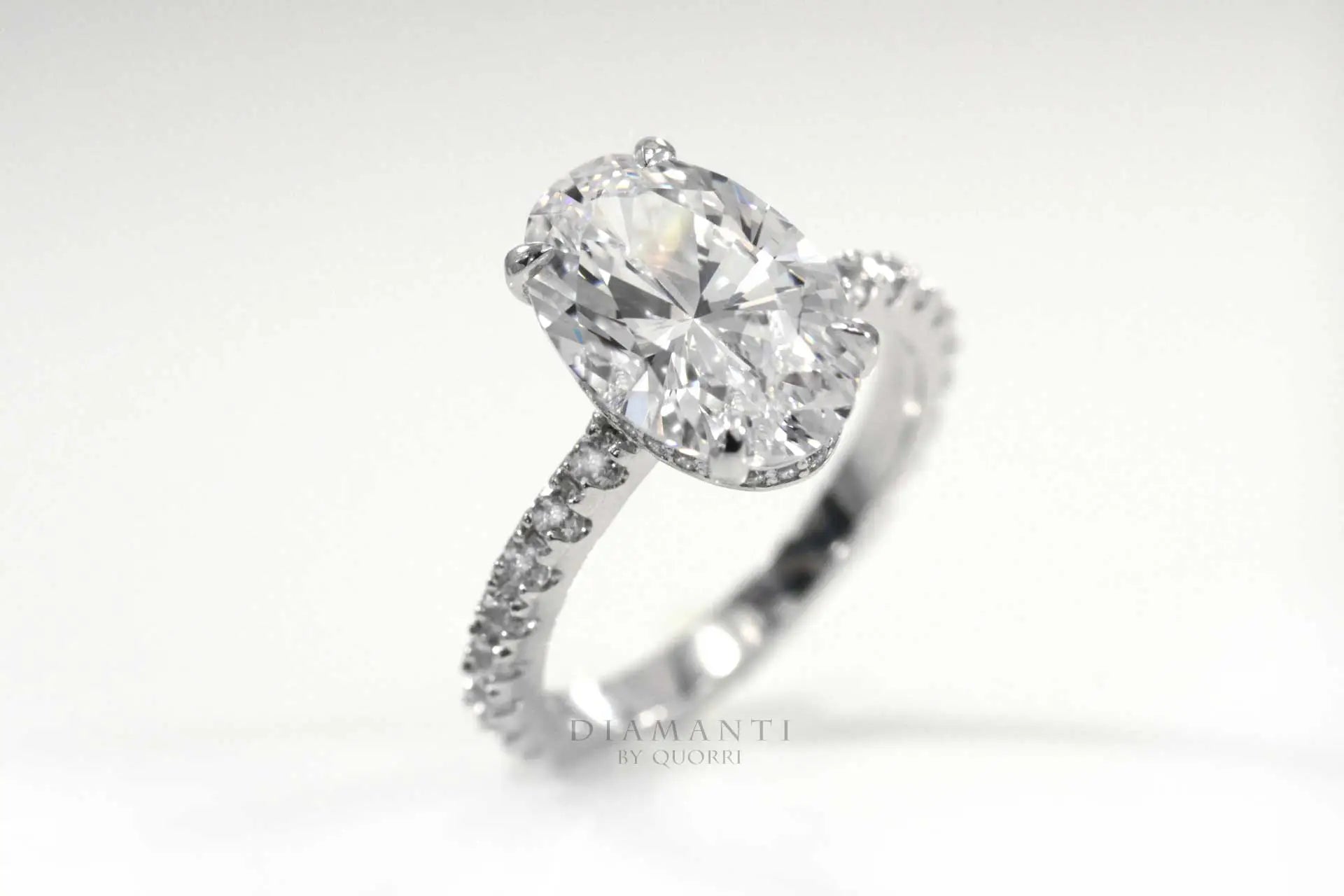 14k white gold 4 carat claw prong hidden-halo oval lab grown diamond accented engagement ring Quorri