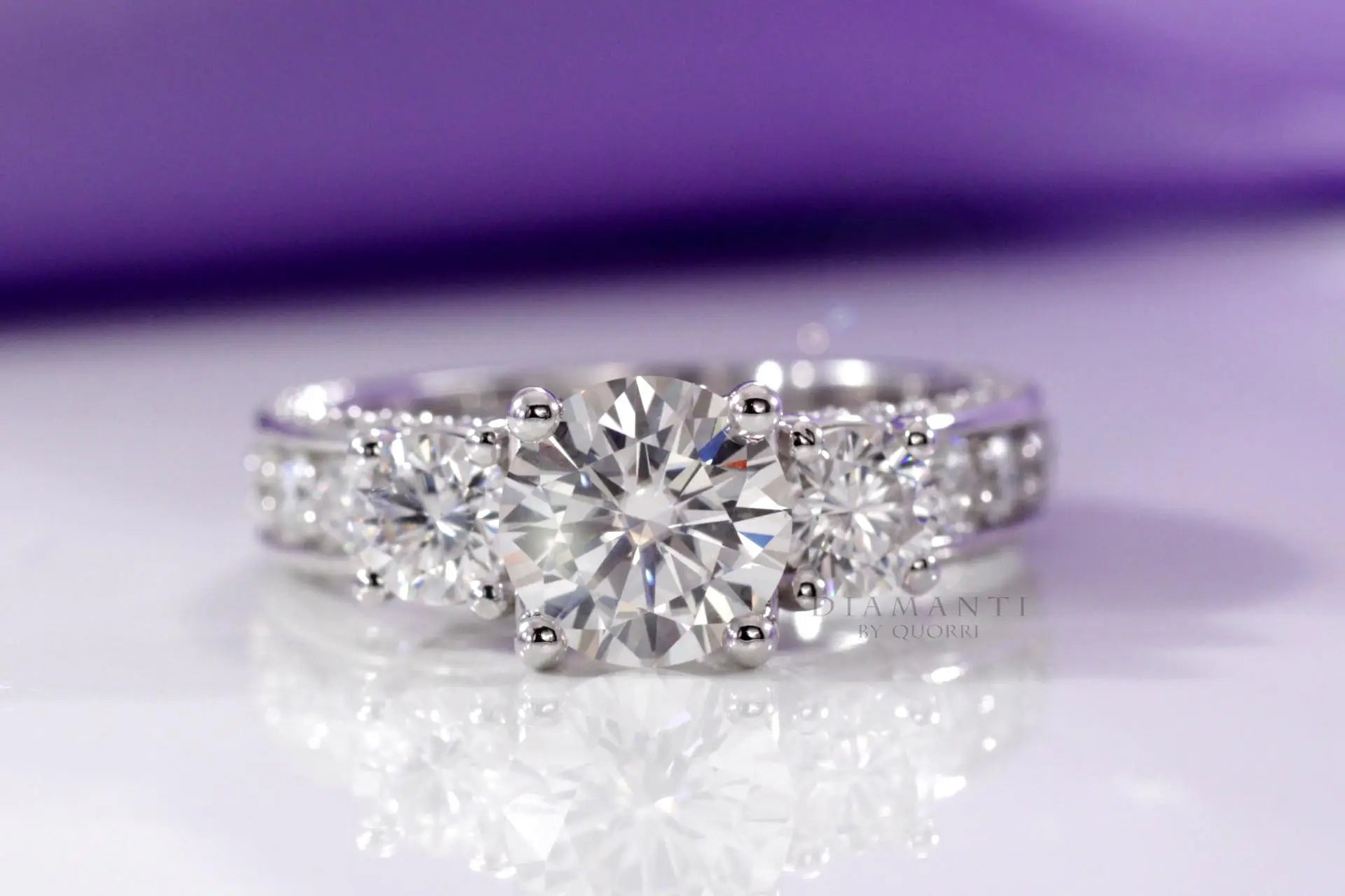 platinum vera wang inspired accented 3 stone round lab grown diamond engagement ring