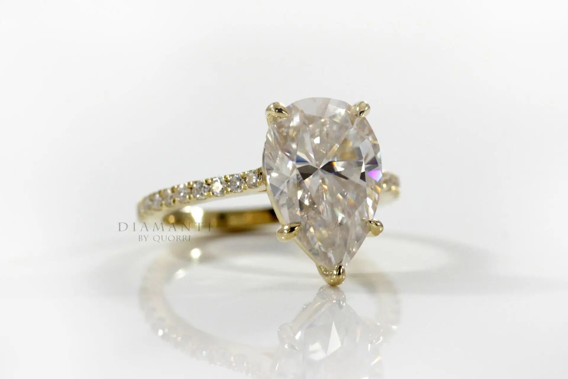 affordable 5 prong yellow gold 4 carat lab diamond pear accented engagement ring Quorri