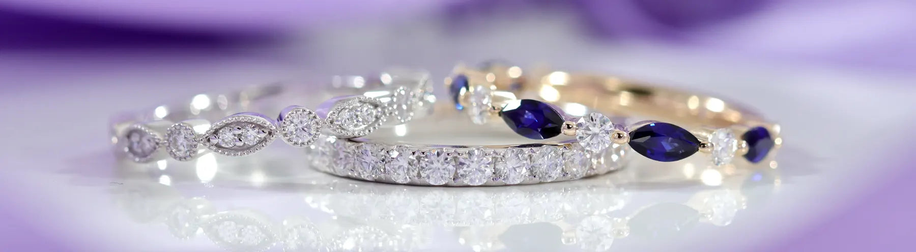 gold and platinum diamond and sapphire wedding and eternity bands at Quorri