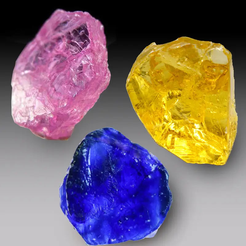 custom cut blue yellow and pink cultured lab made sapphires at Quorri